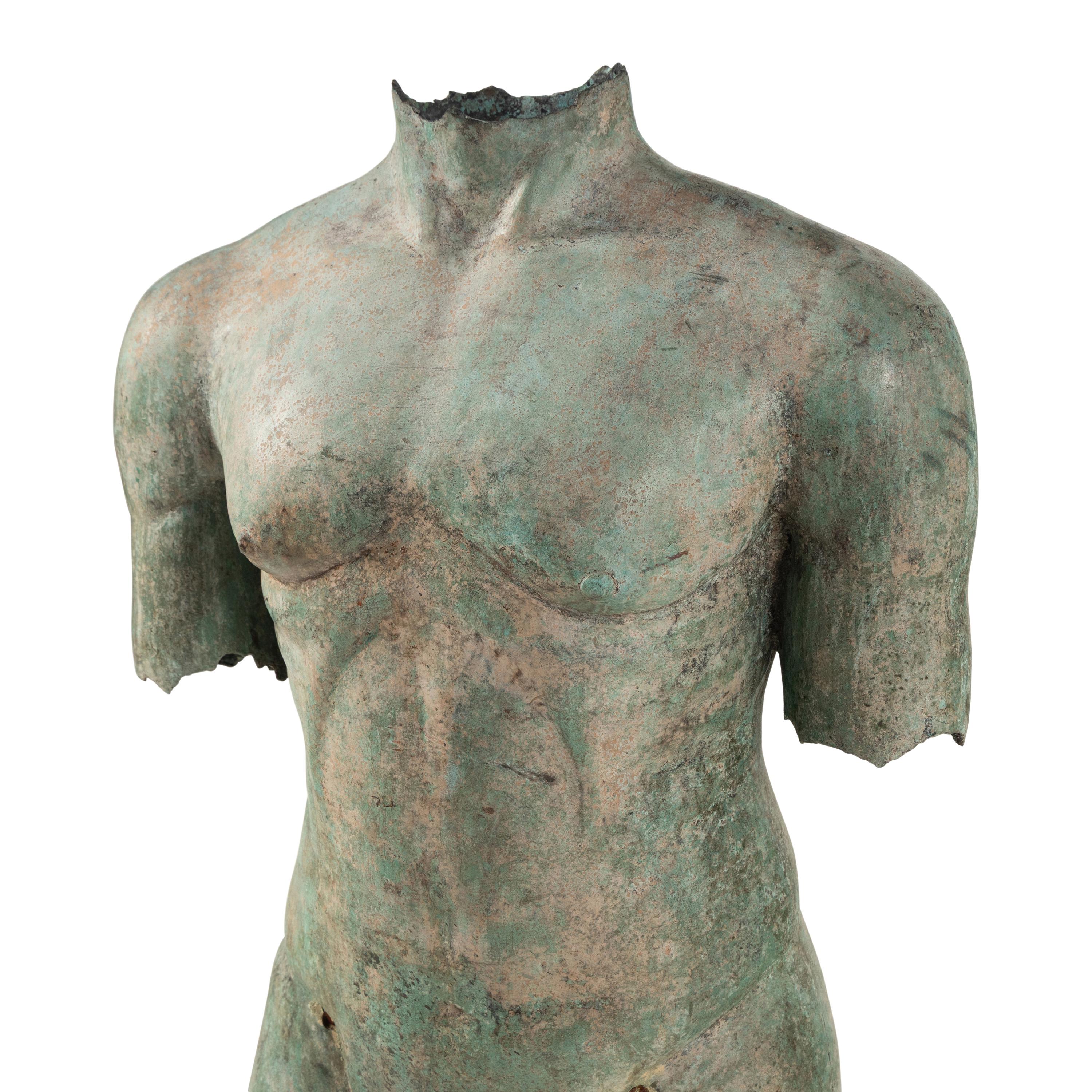 A Bronze Torso on Stone Plinth
