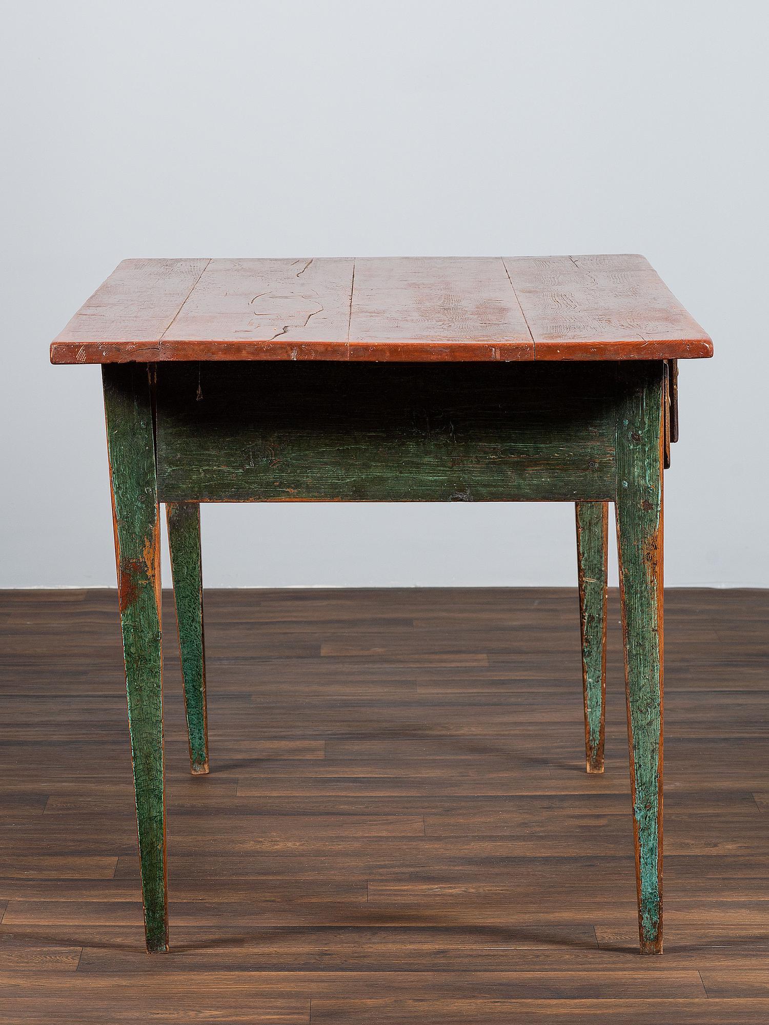A Country Paint Decorated Pine Three-Drawer Farm Table