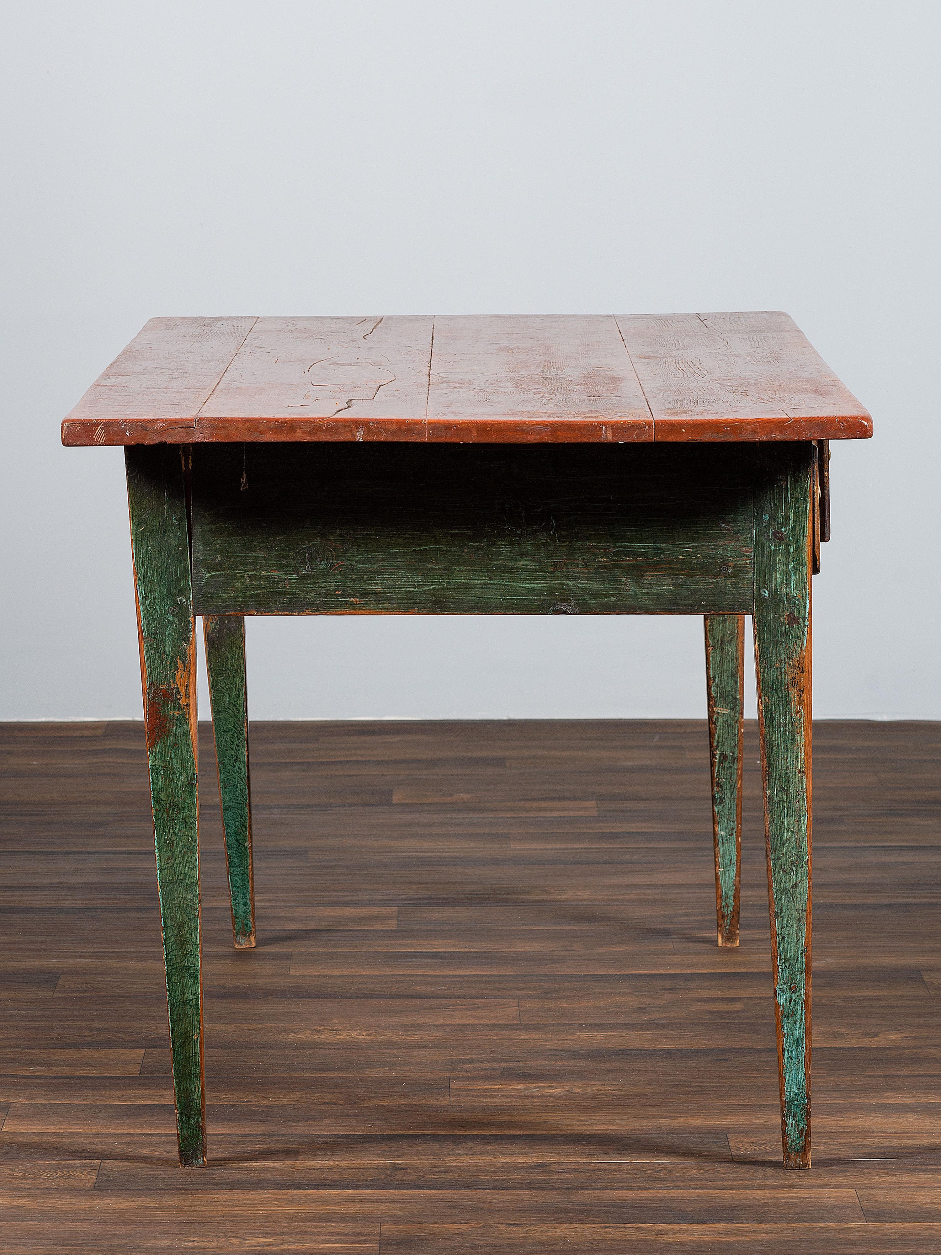 A Country Paint Decorated Pine Three-Drawer Farm Table