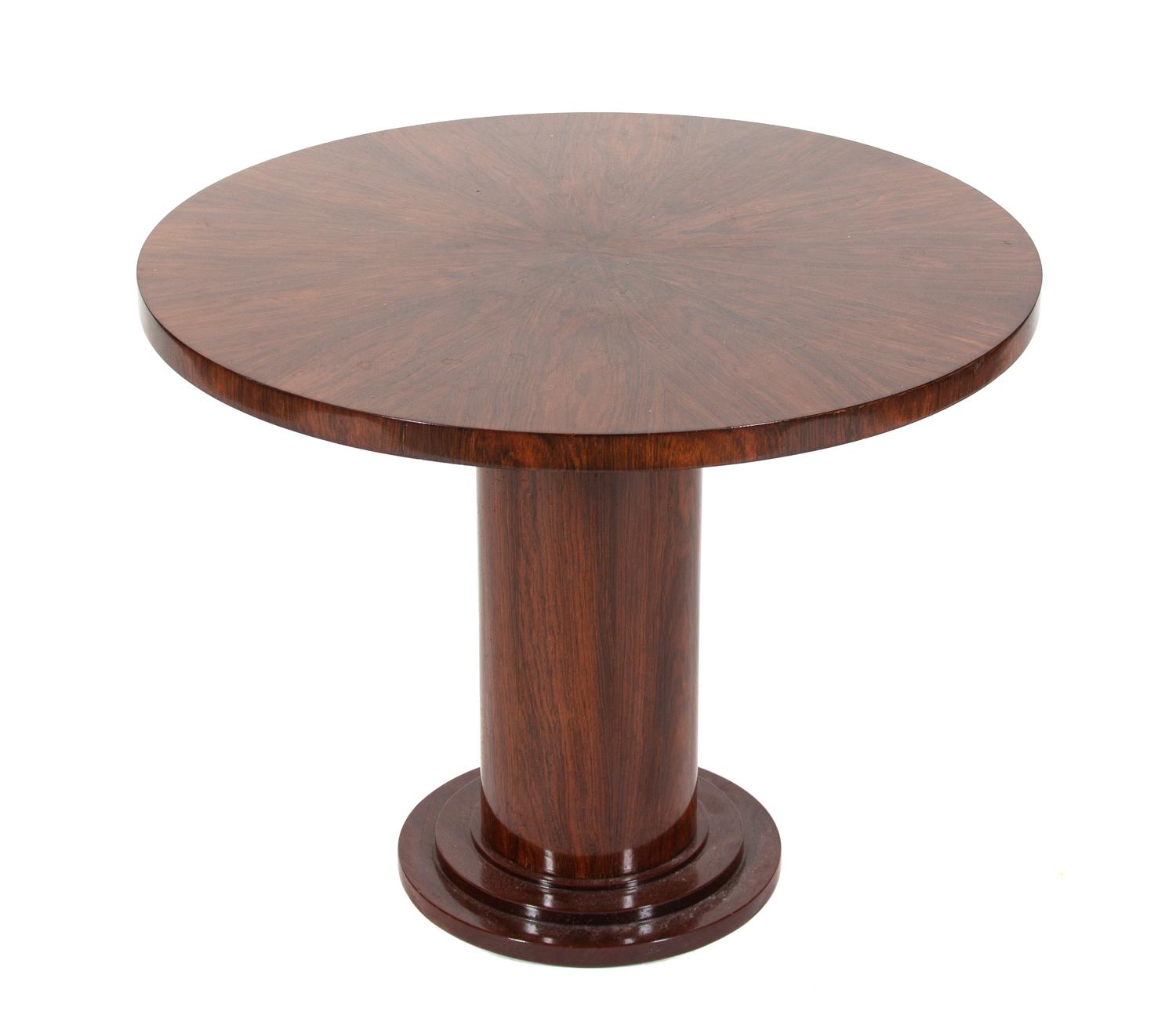 An Art Deco Style Rosewood Veneered Side Table Height 21 1/2 x diameter 27 1/2 inches. — 20TH CENTURY