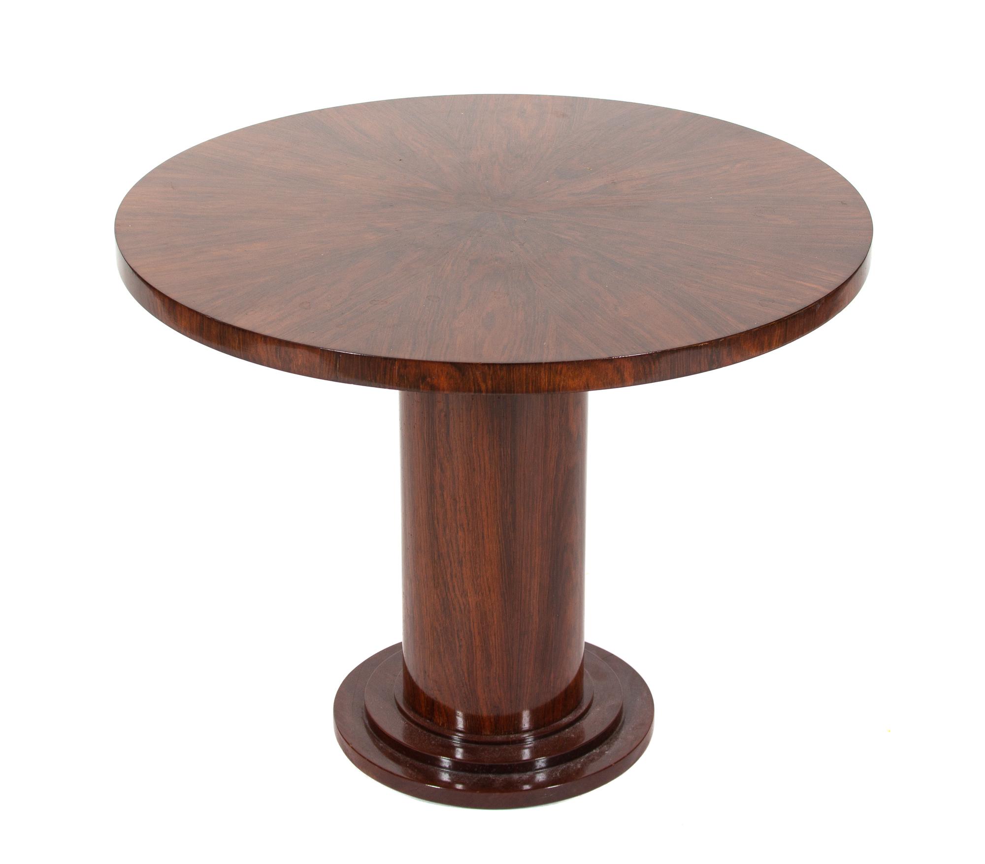An Art Deco Style Rosewood Veneered Side Table Height 21 1/2 x diameter 27 1/2 inches. — 20TH CENTURY