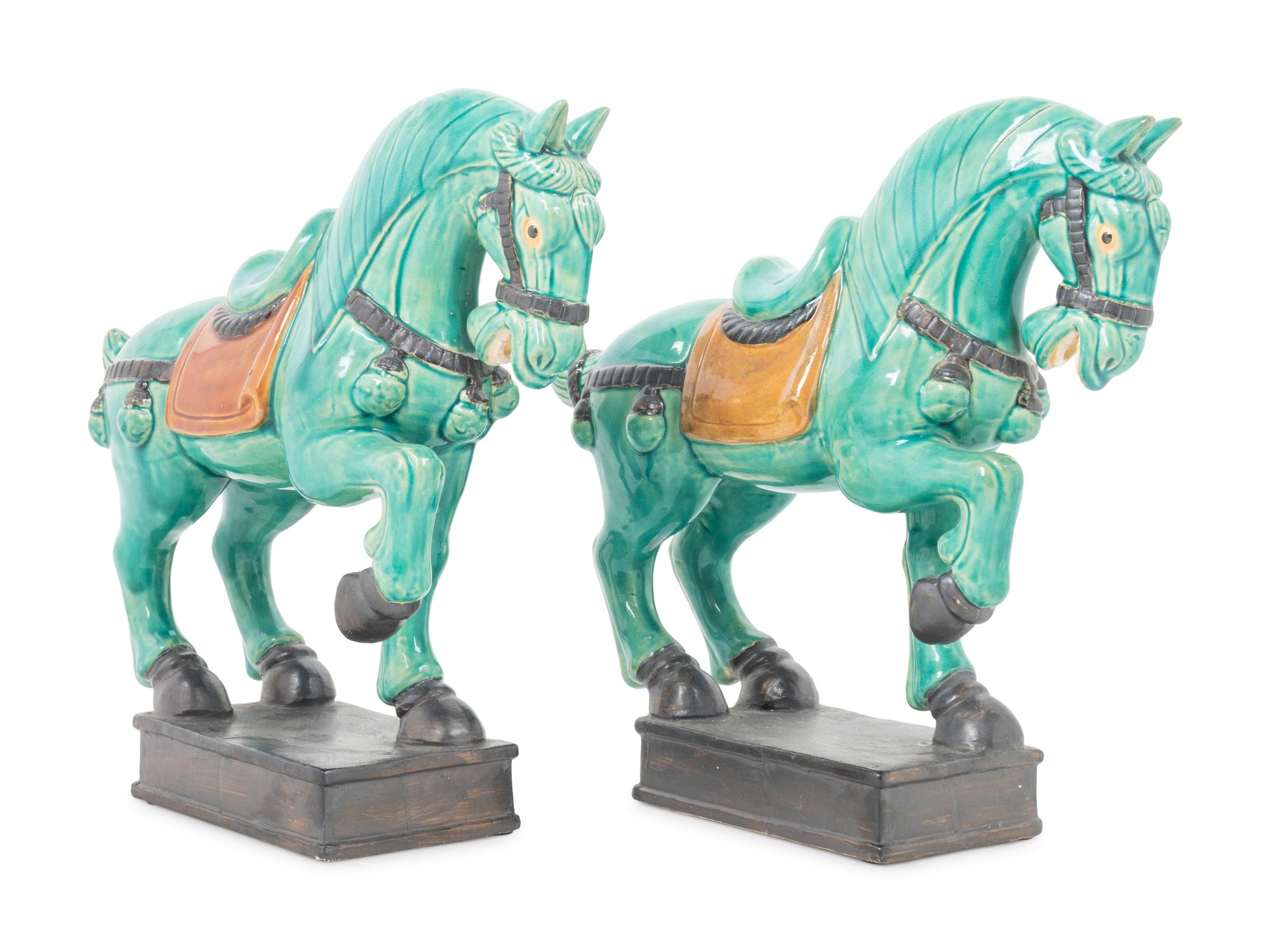 A Pair of Turquoise Glazed Pottery Horses