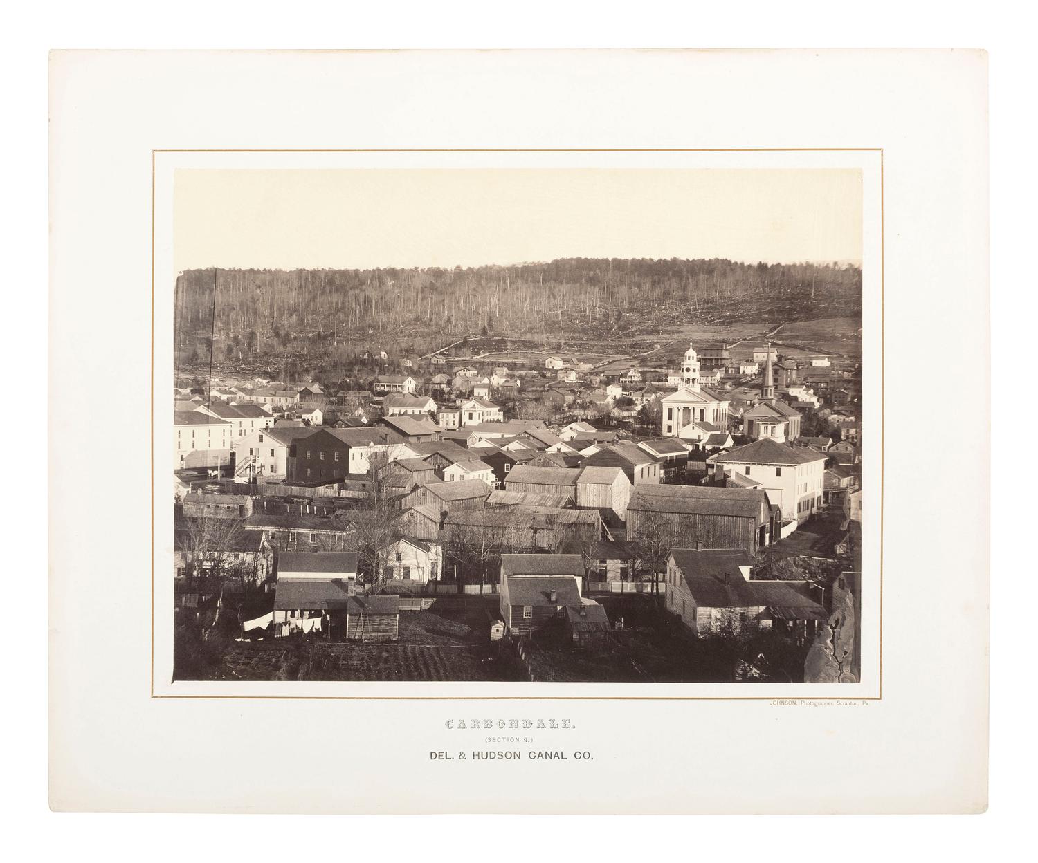 Pennsylvania JOHNSON, Thomas H. (b. 1821), photographer. Exceptional 3-section panoramic view of Carbondale, PA. Ca 1863-1865.
