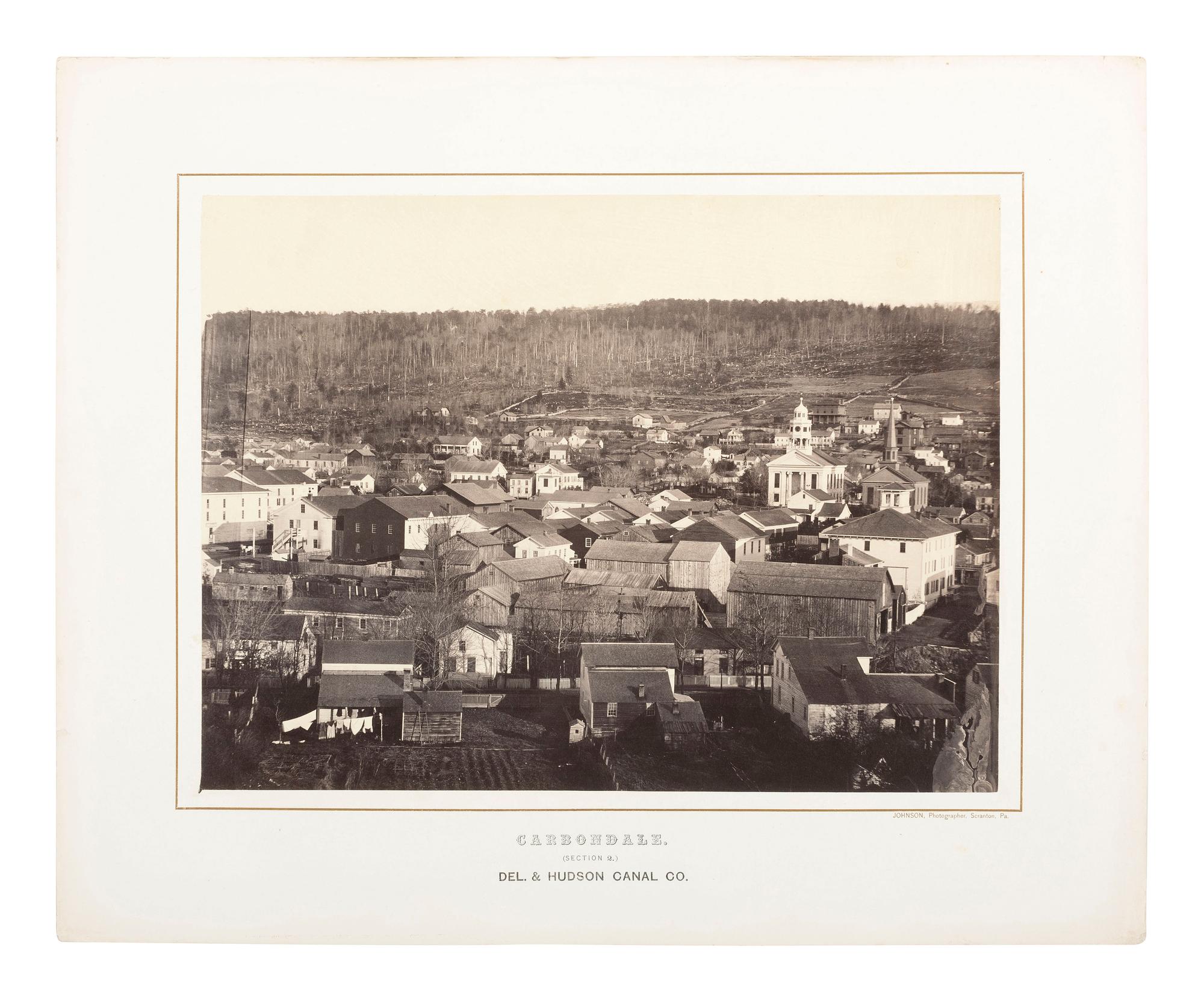 Pennsylvania JOHNSON, Thomas H. (b. 1821), photographer. Exceptional 3-section panoramic view of Carbondale, PA. Ca 1863-1865.