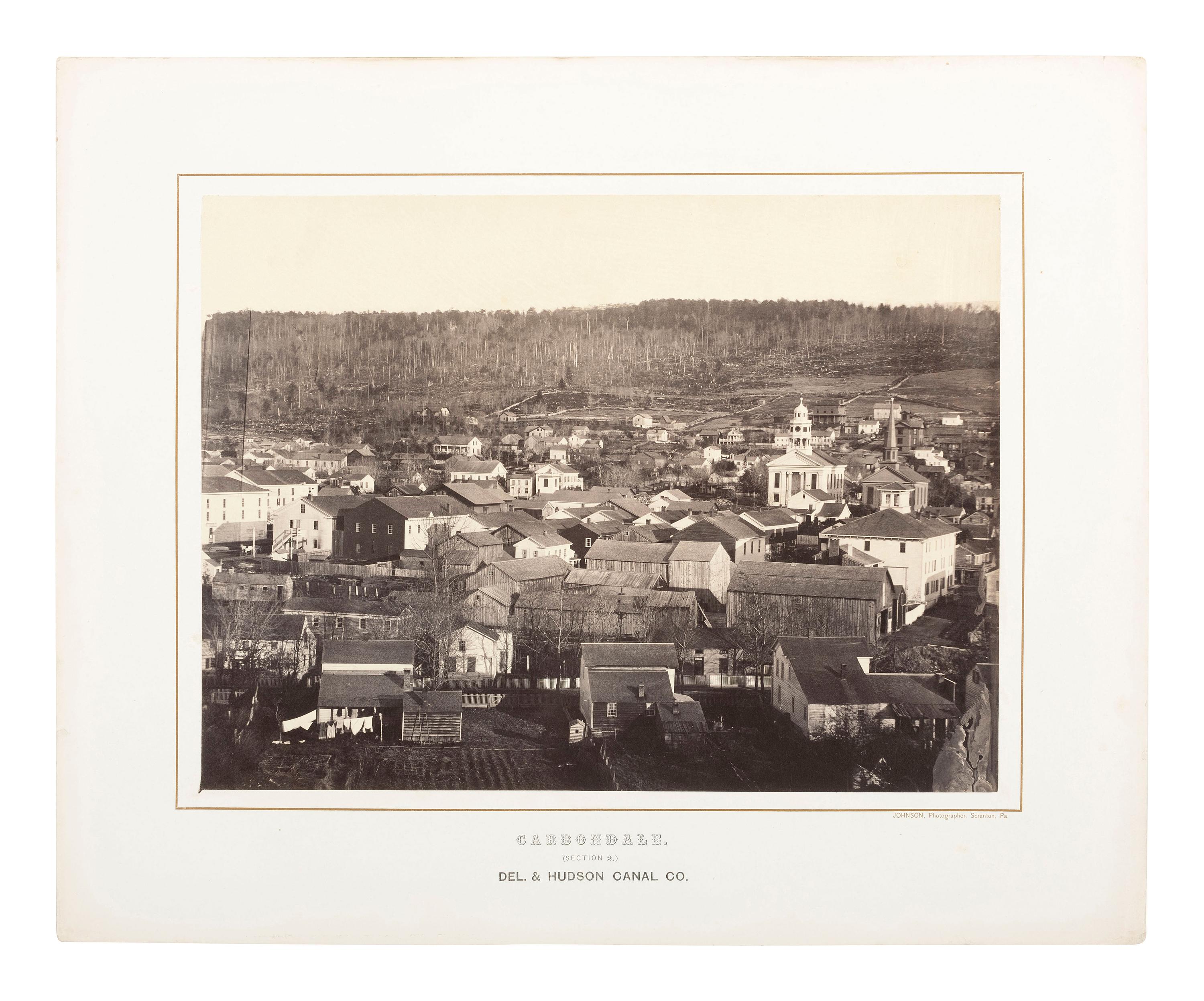 Pennsylvania JOHNSON, Thomas H. (b. 1821), photographer. Exceptional 3-section panoramic view of Carbondale, PA. Ca 1863-1865.