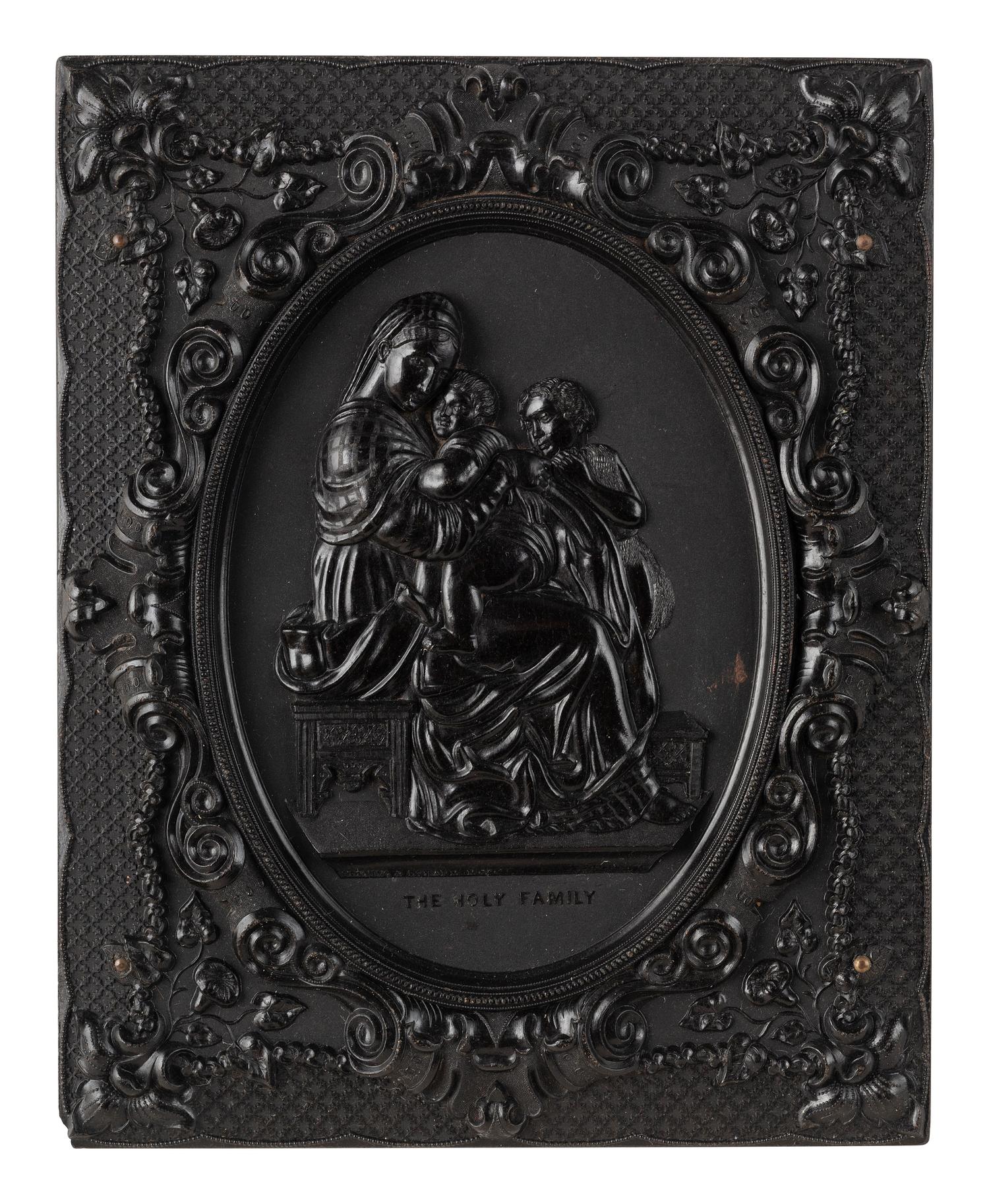 [EARLY PHOTOGRAPHY]. 3 half plate figural Union cases, one containing tintype of a wedding couple.