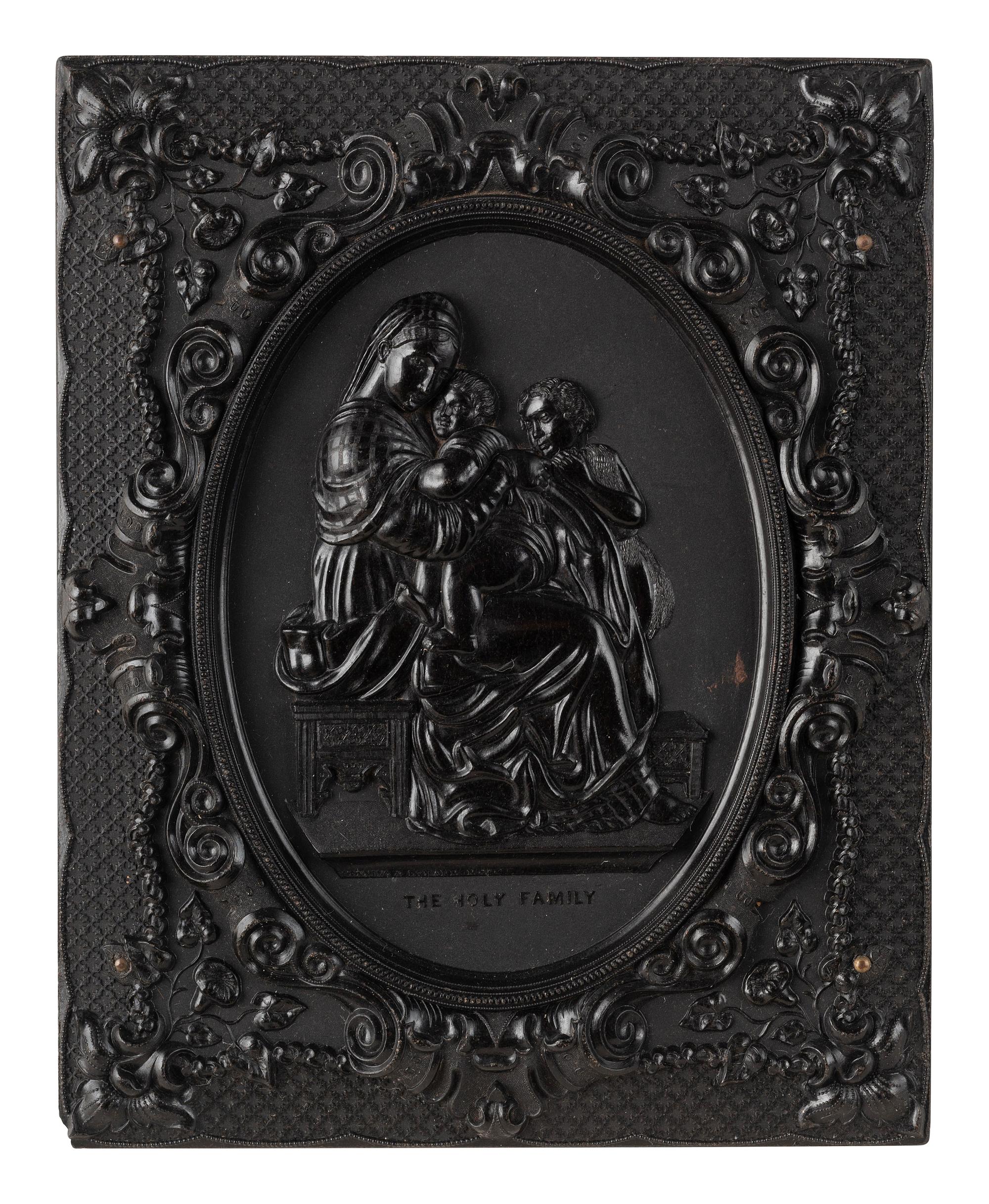 [EARLY PHOTOGRAPHY]. 3 half plate figural Union cases, one containing tintype of a wedding couple.