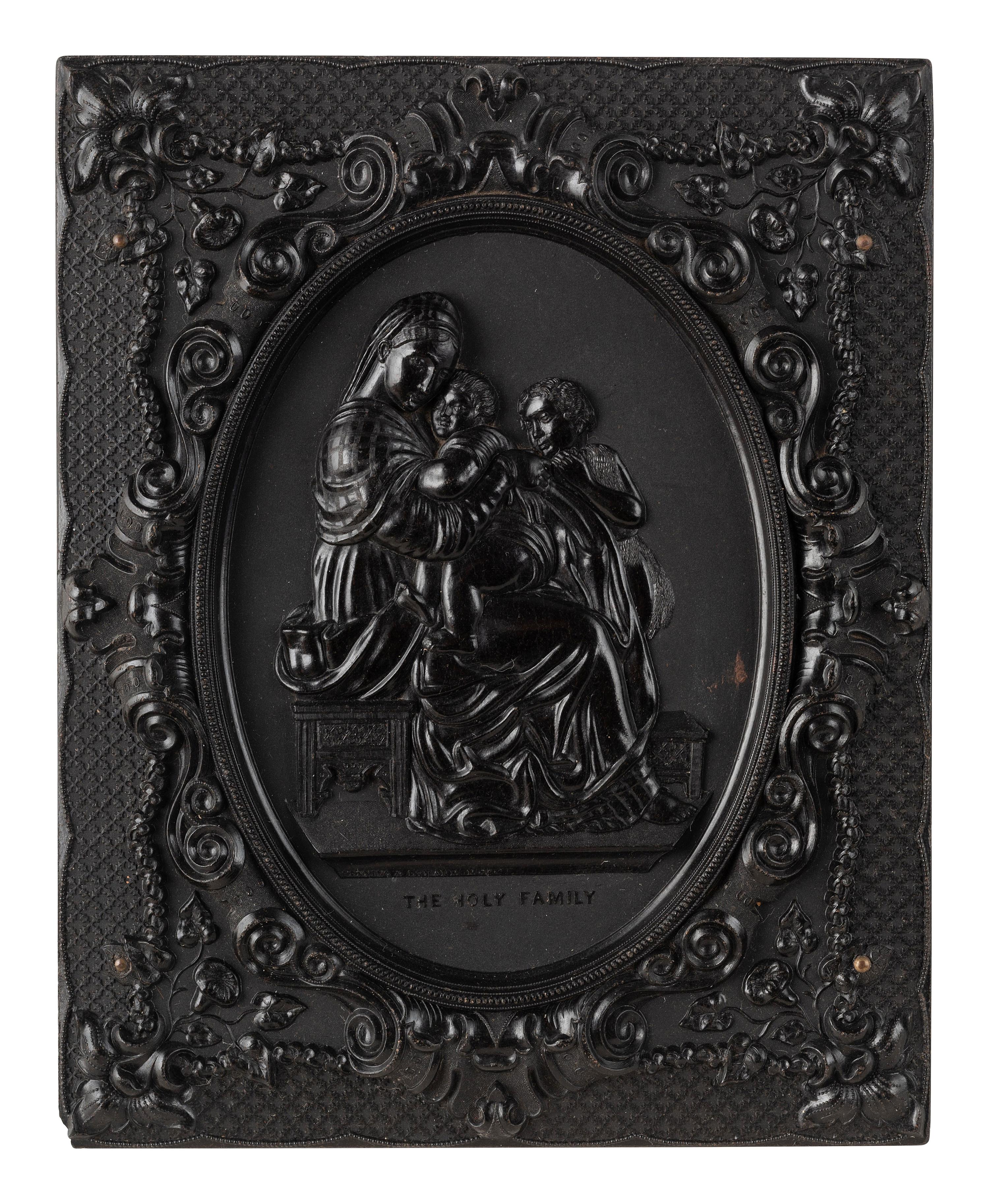 [EARLY PHOTOGRAPHY]. 3 half plate figural Union cases, one containing tintype of a wedding couple.