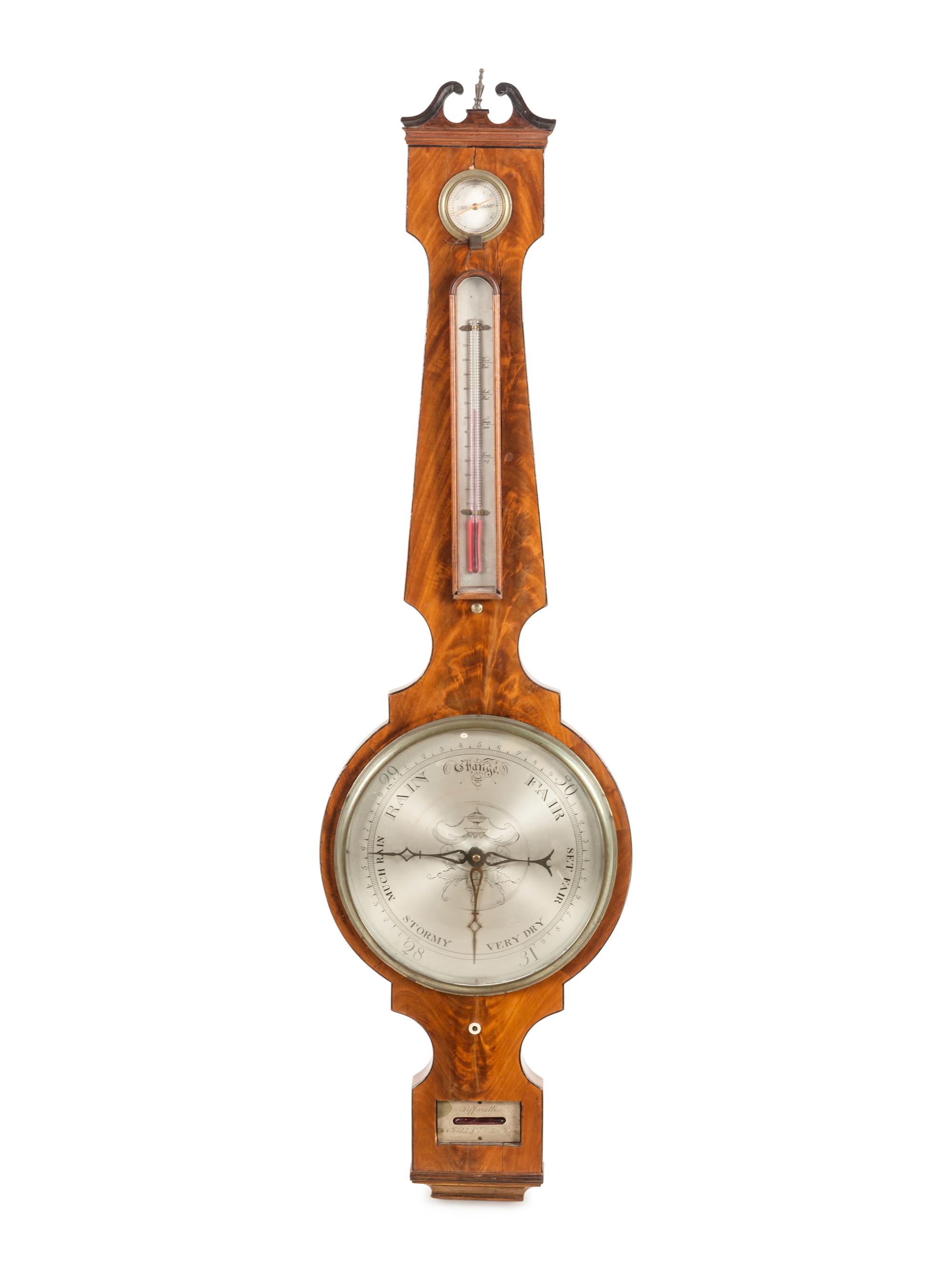 A Regency Mahogany Wheel Barometer