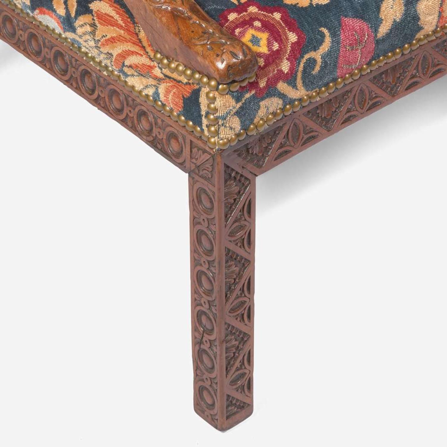 A George III carved walnut library armchair circa 1765