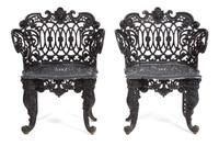 A Victorian Three-Piece Painted Iron Garden Suite Height of bench 33 x width 44 1/4 inches. — 19TH CENTURY