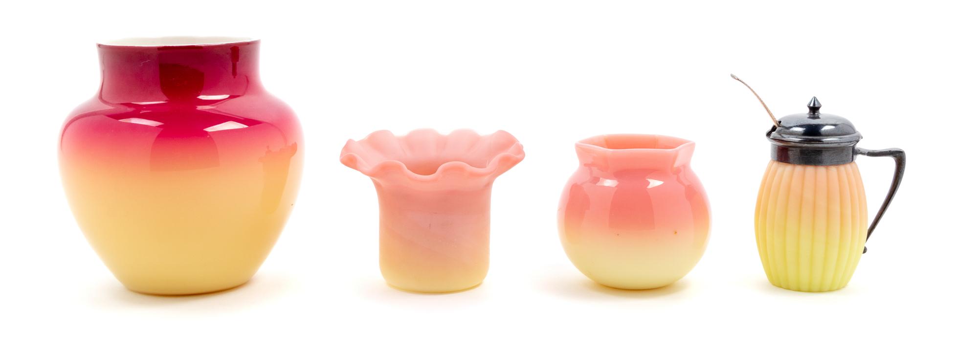 A Group of Four Glass Articles in yellow and pink, one with…