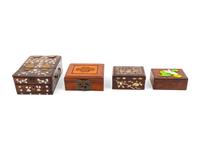 A Group of Four Chinese Hardwood Covered Boxes