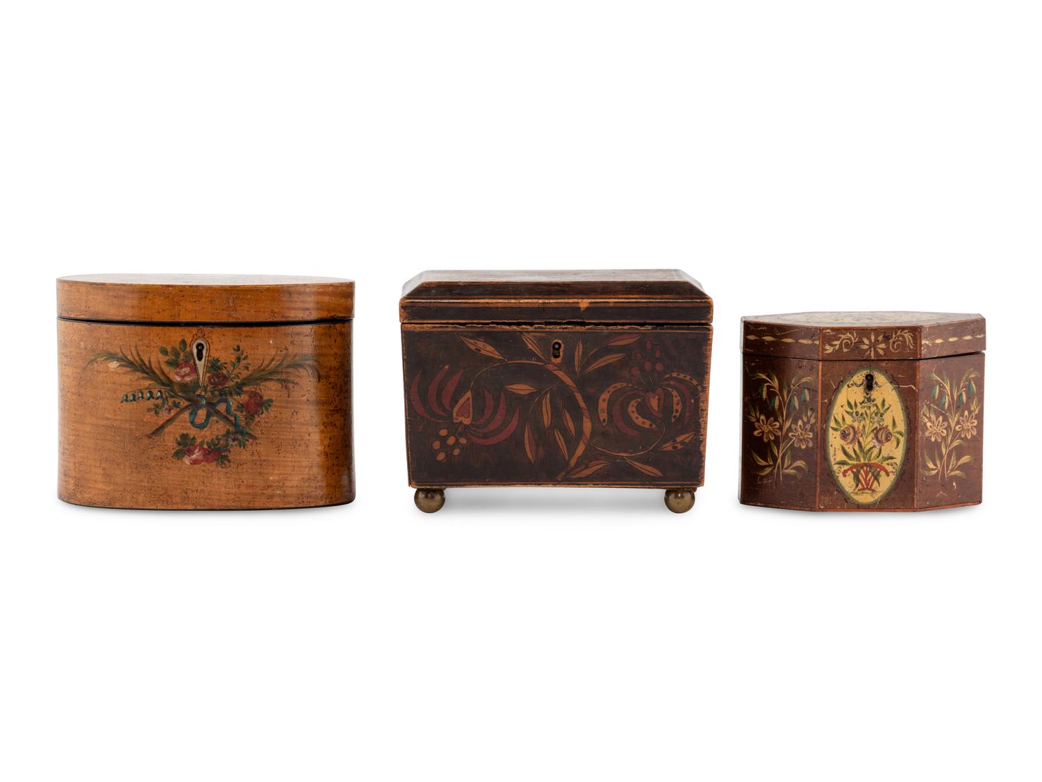 A Group of Three English Polychrome Decorated Tea Caddies