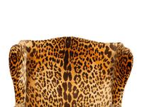 A George III Style Mahogany Wing Chair with Leopard Print Upholstery
