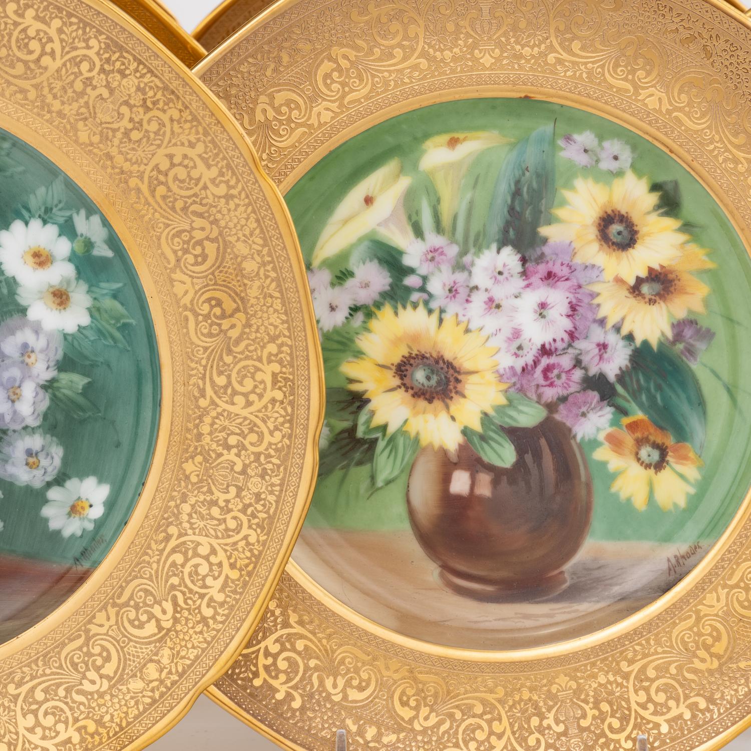 A Set of Sixteen Continental Gilt and Polychrome Painted Cabinet Plates