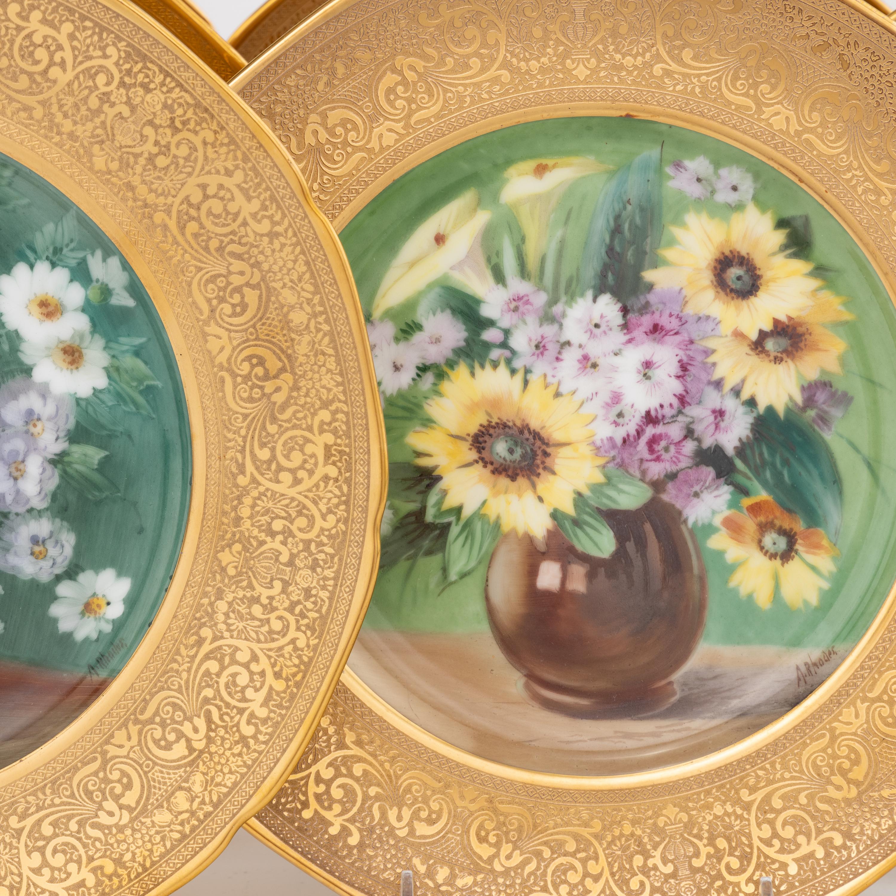 A Set of Sixteen Continental Gilt and Polychrome Painted Cabinet Plates