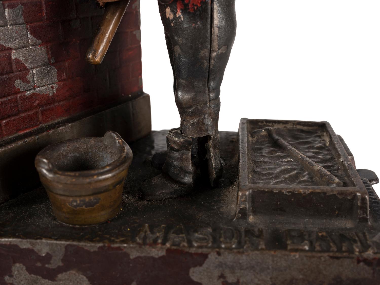 A Mason Cast Iron Mechanical Bank