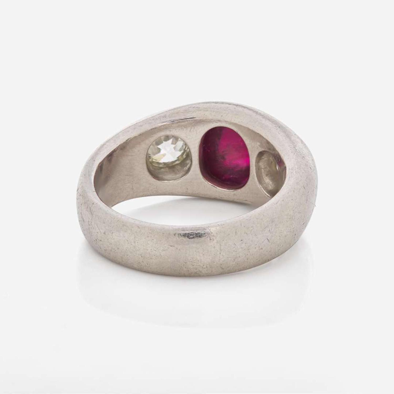 A Three-Stone Art Deco Platinum, Ruby, and Diamond Ring C.1920