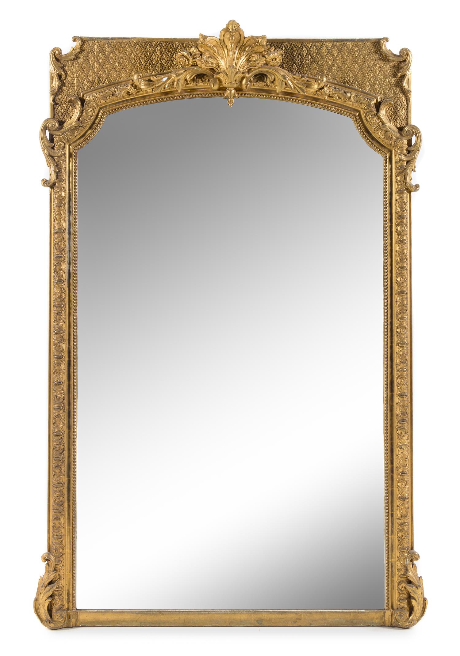 A Napoleon III Giltwood and Composition Mirror Height 75 x width 50 inches. — LATE 19TH CENTURY