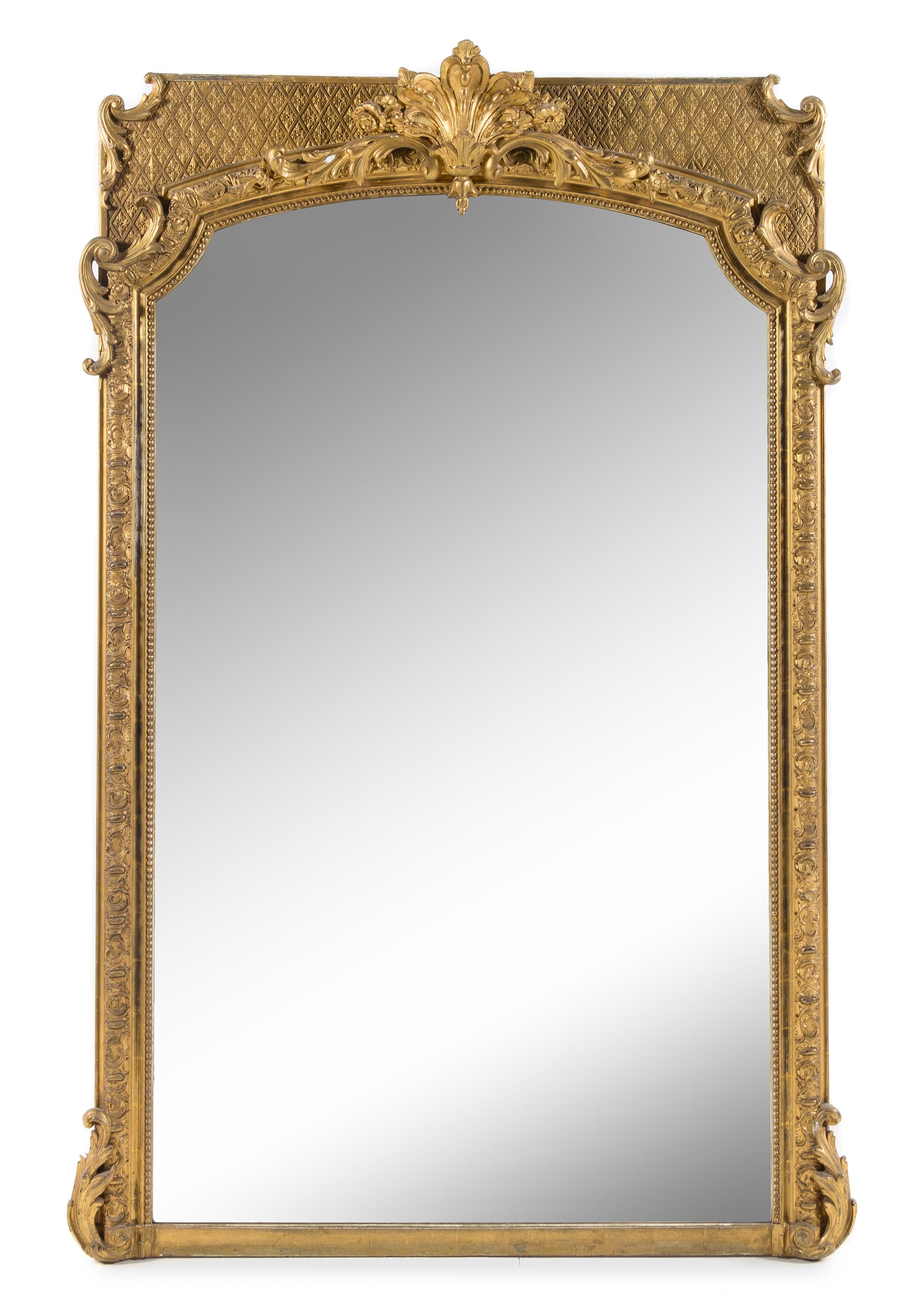 A Napoleon III Giltwood and Composition Mirror Height 75 x width 50 inches. — LATE 19TH CENTURY
