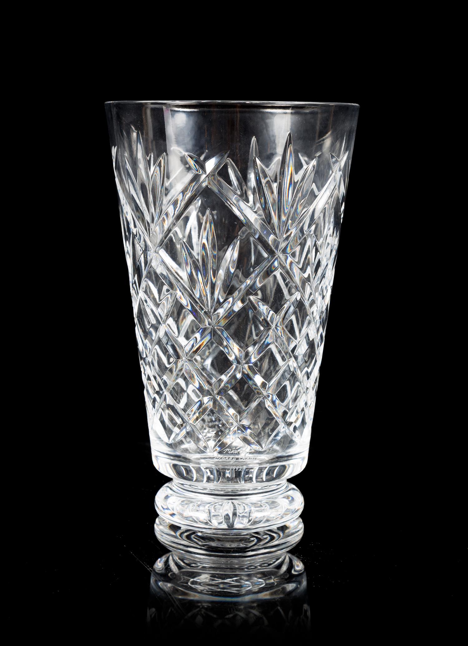 Waterford, a cut glass vase, of tapering footed form