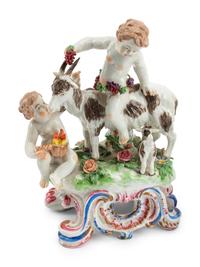 A Pair of Chelsea Porcelain Figural Groups