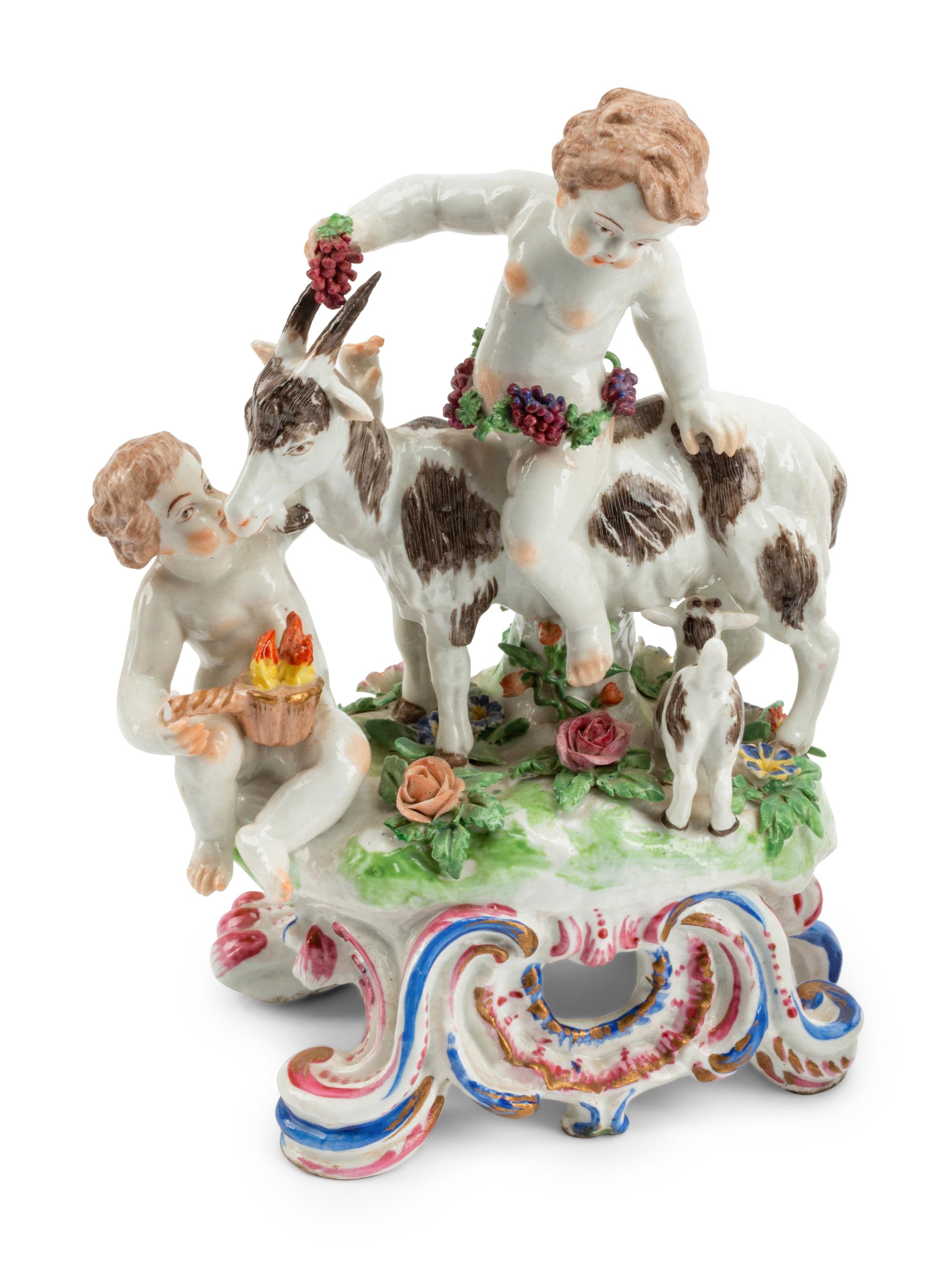 A Pair of Chelsea Porcelain Figural Groups