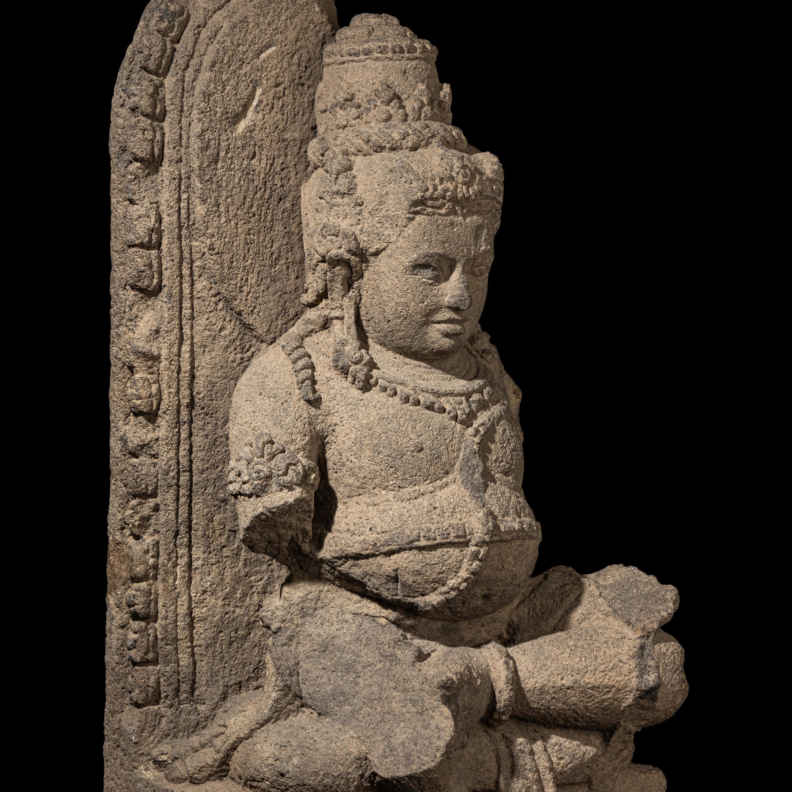 An Indonesia Figure of Kubera, Central Java, 9th Century 九世紀 爪窪石雕毗罗坐像