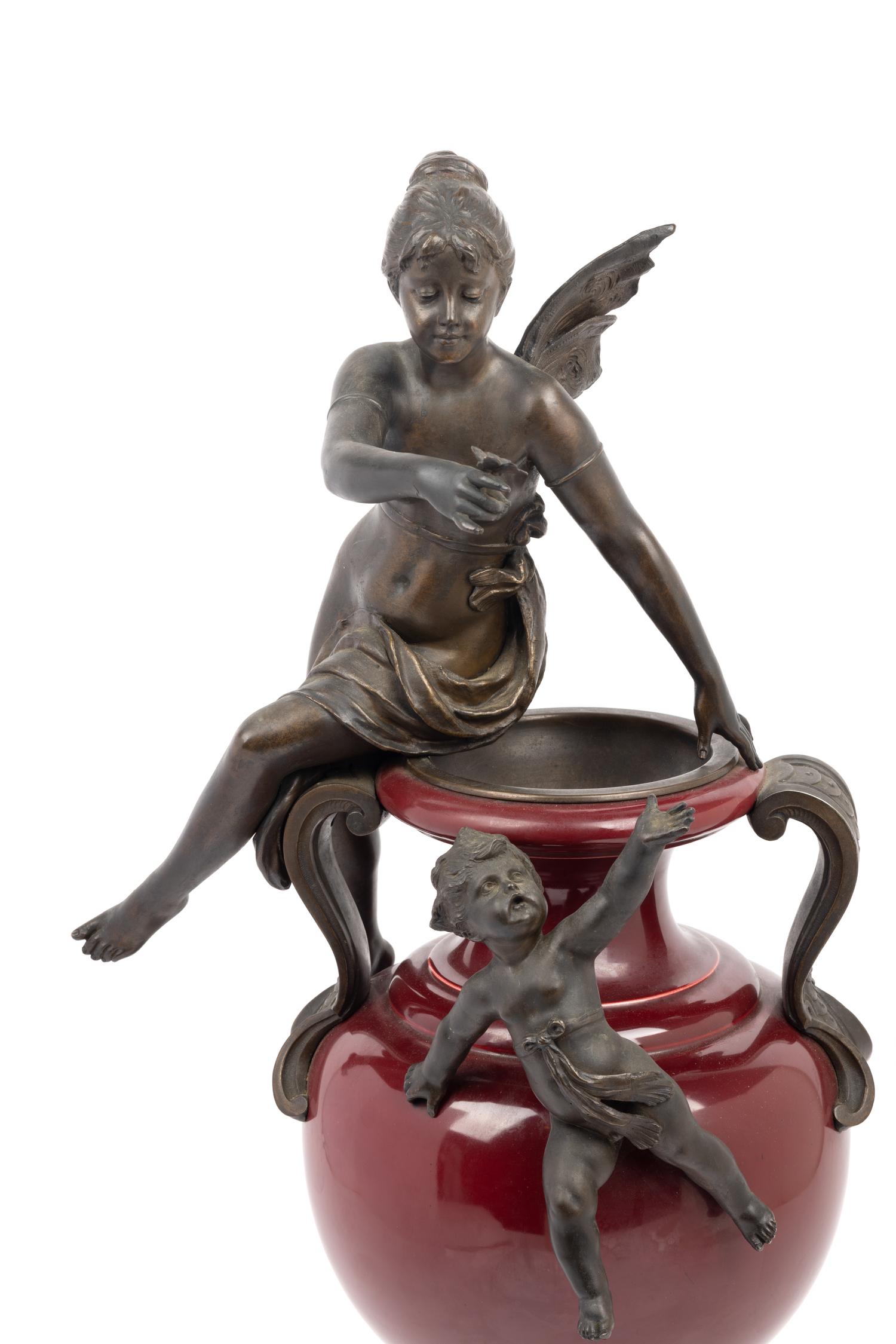 A Continental Bronze Mounted Ceramic Urn