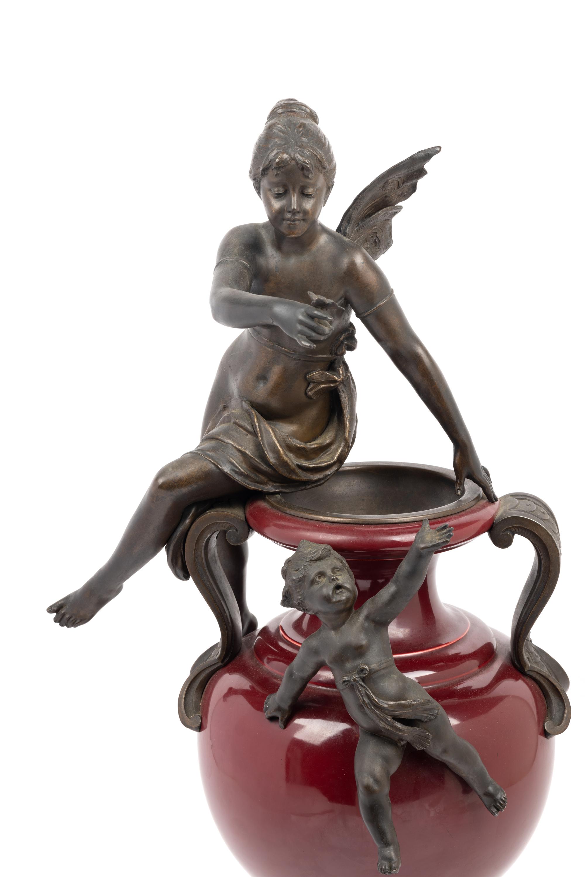A Continental Bronze Mounted Ceramic Urn