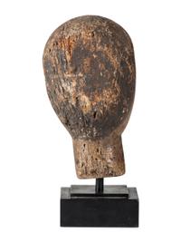 A Carved and Painted Wooden Head