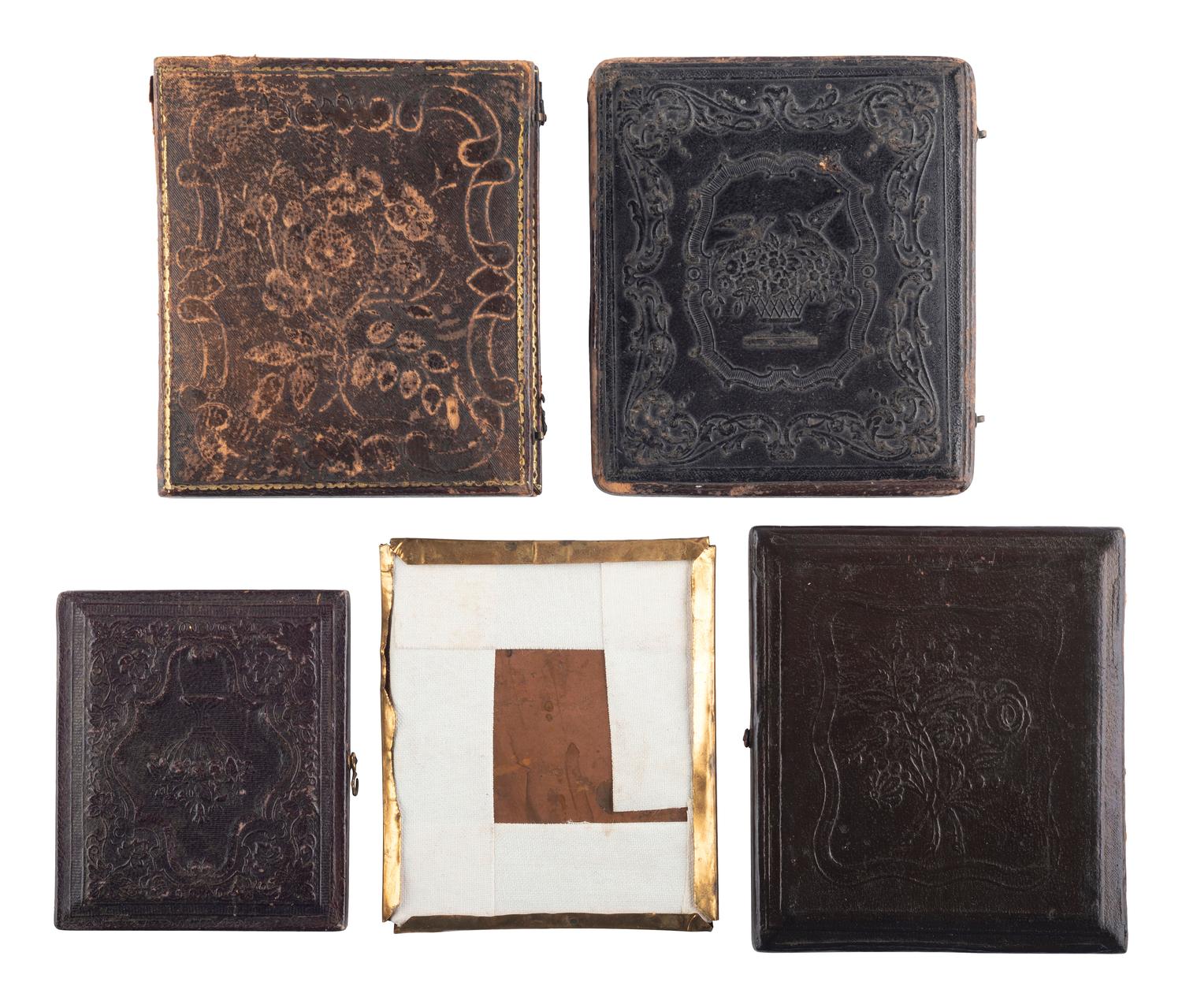 [EARLY PHOTOGRAPHY]. A group of 13 daguerreotypes of families, incl. several portraits of women and children.