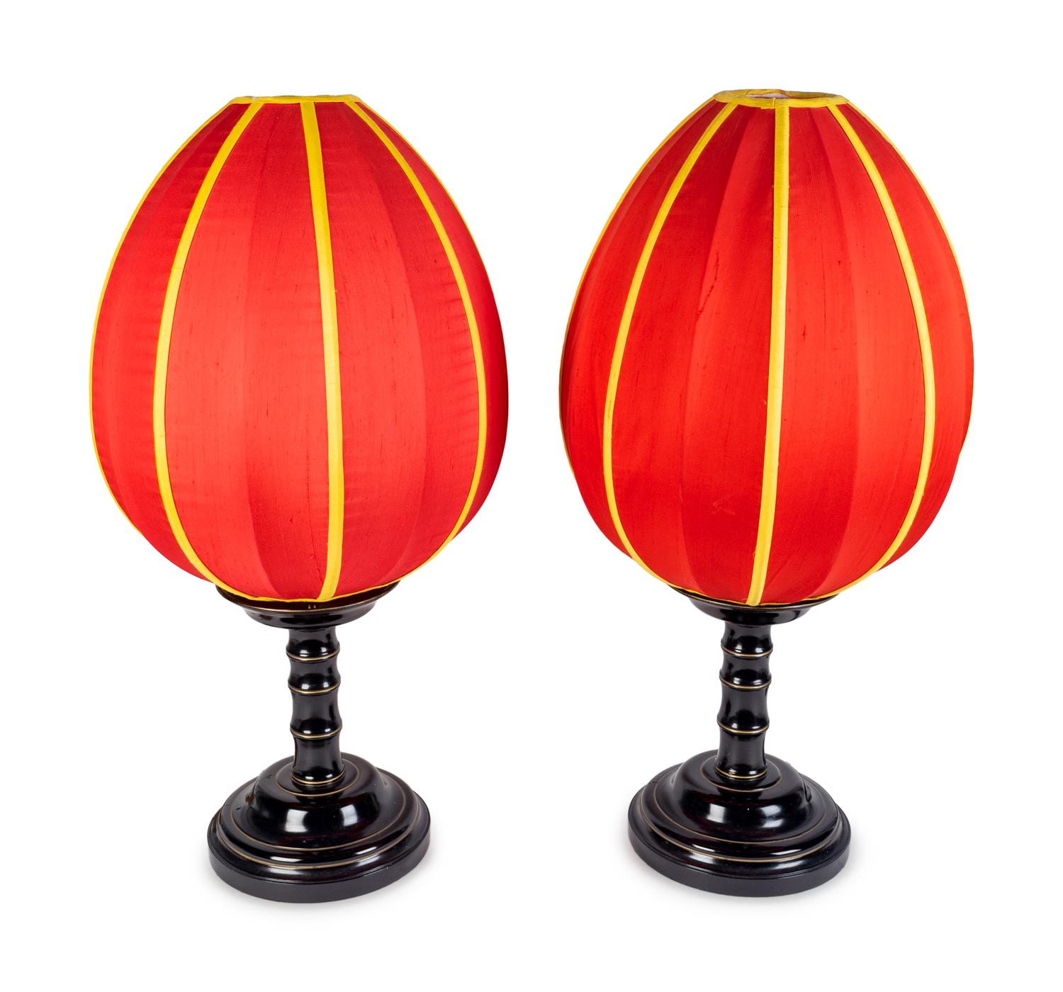 A Pair of Ebonized Base and Red Cocoon Shade Table Lamps — MID-20TH CENTURY