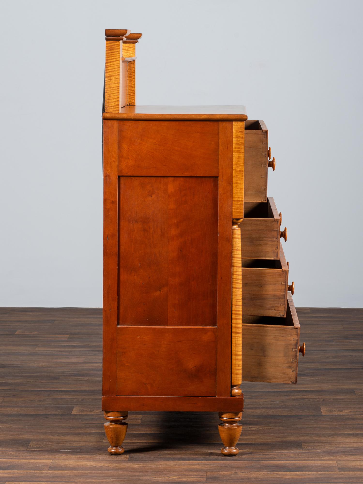 A Late Federal Cherrywood and Tiger Maple Chest of Drawers