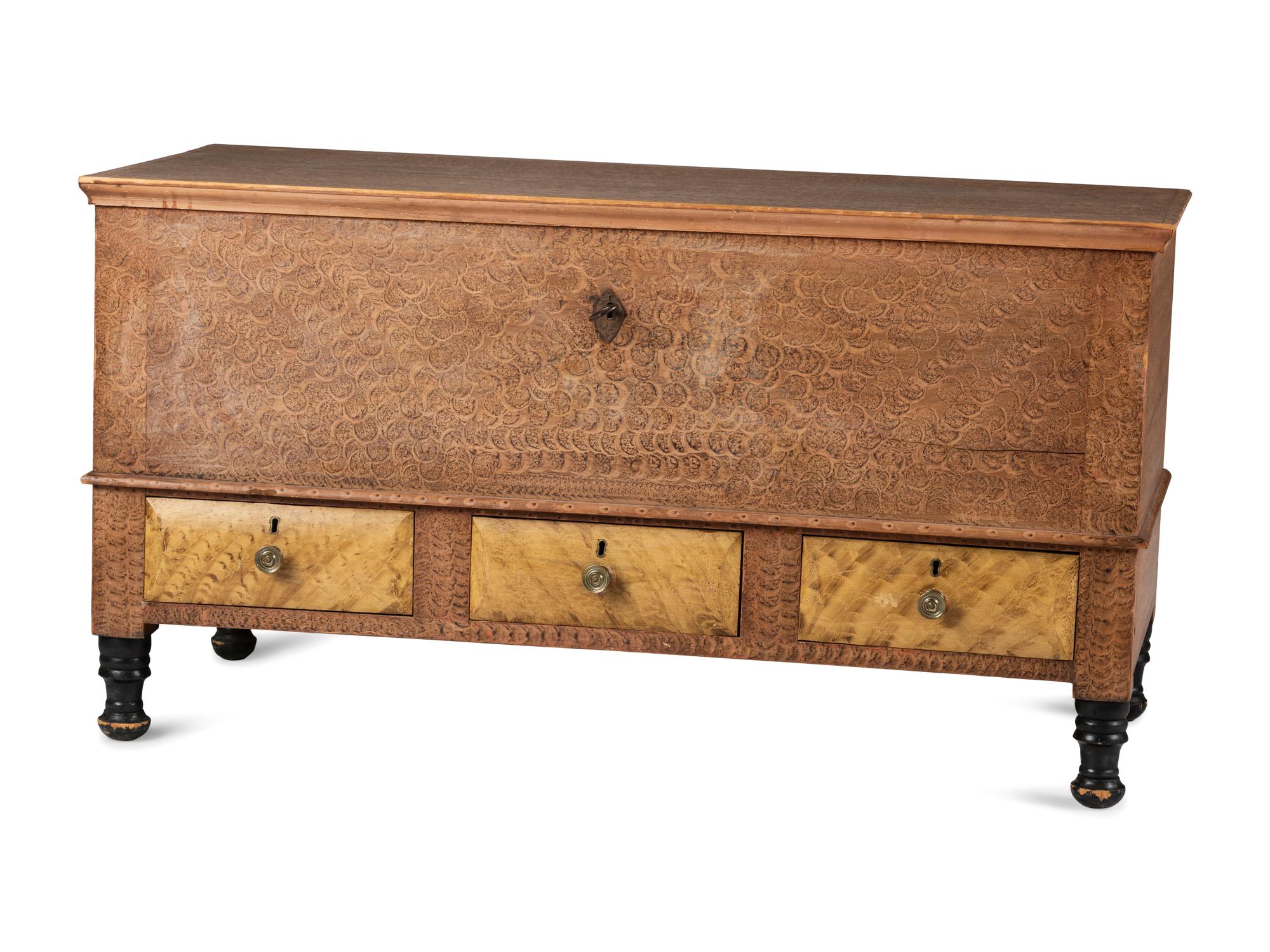 A Grain Paint Decorated and Part Ebonized Three-Drawer Blanket Chest