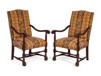 Four Spanish Colonial Style Carved Mahogany Open Armchairs — 20TH CENTURY