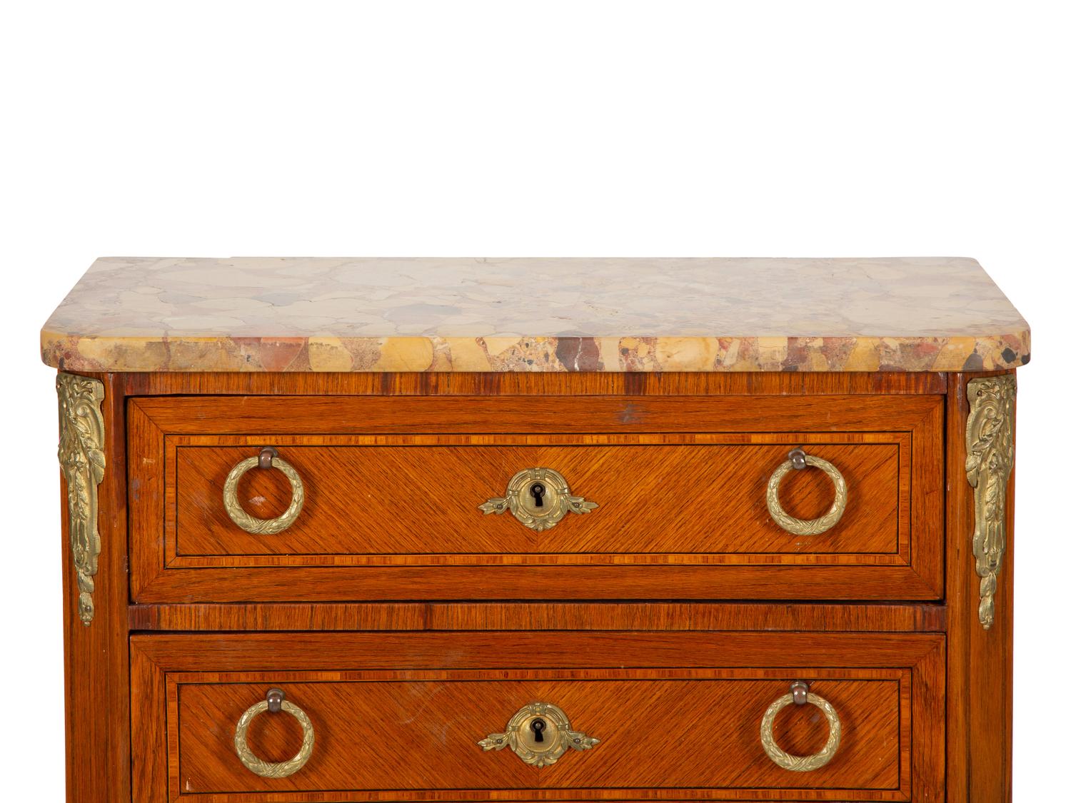 A Louis XVI Style Marble Top Semanier