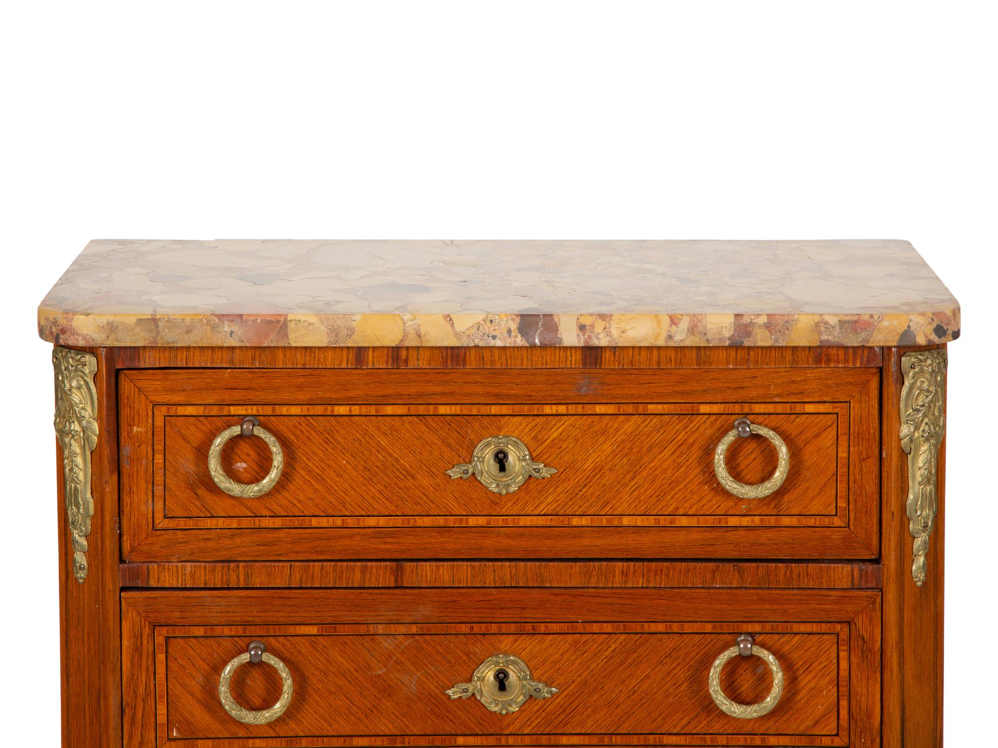 A Louis XVI Style Marble Top Semanier
