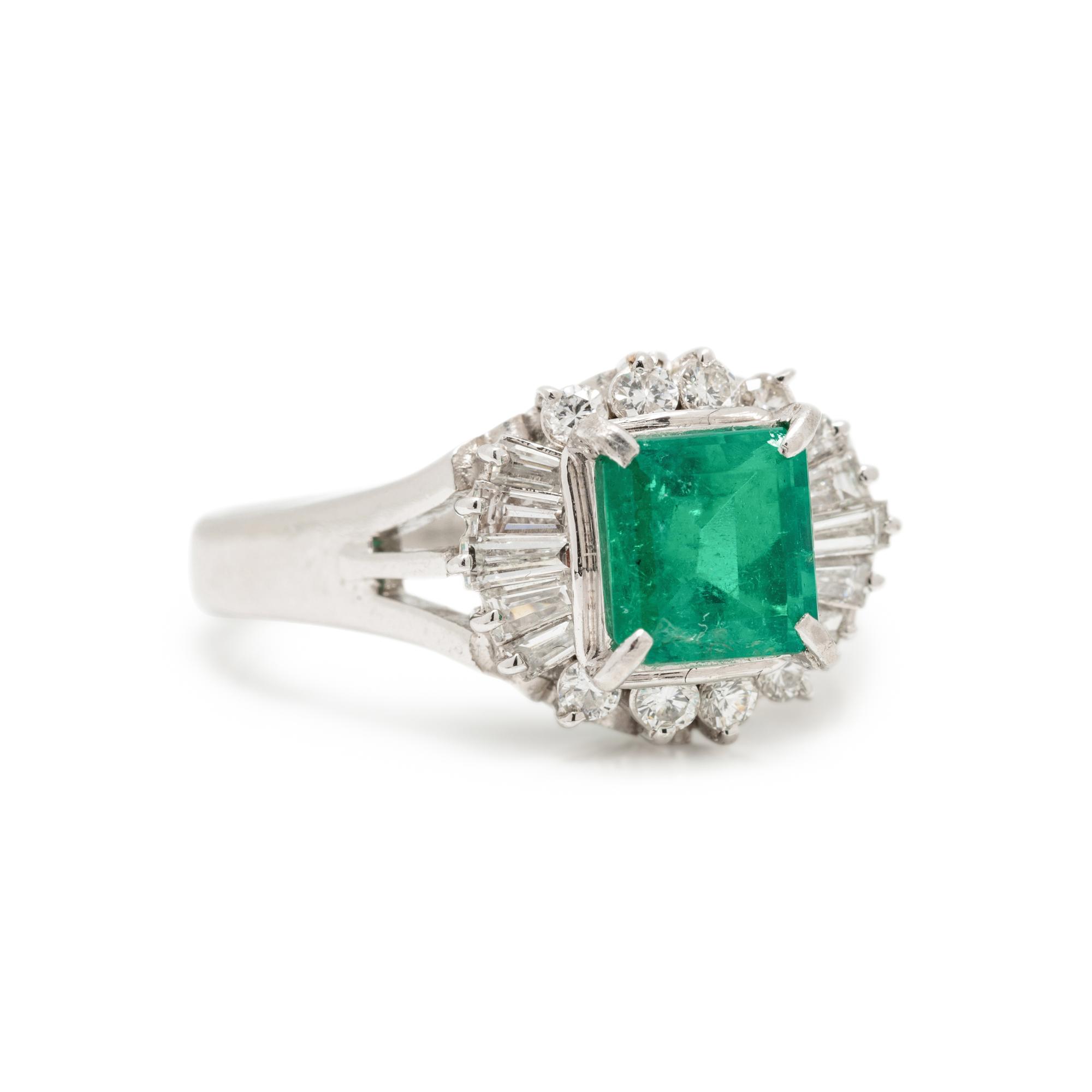 PLATINUM, EMERALD, AND DIAMOND RING