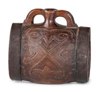 A Pennsylvania Dutch Carved Wood Canteen