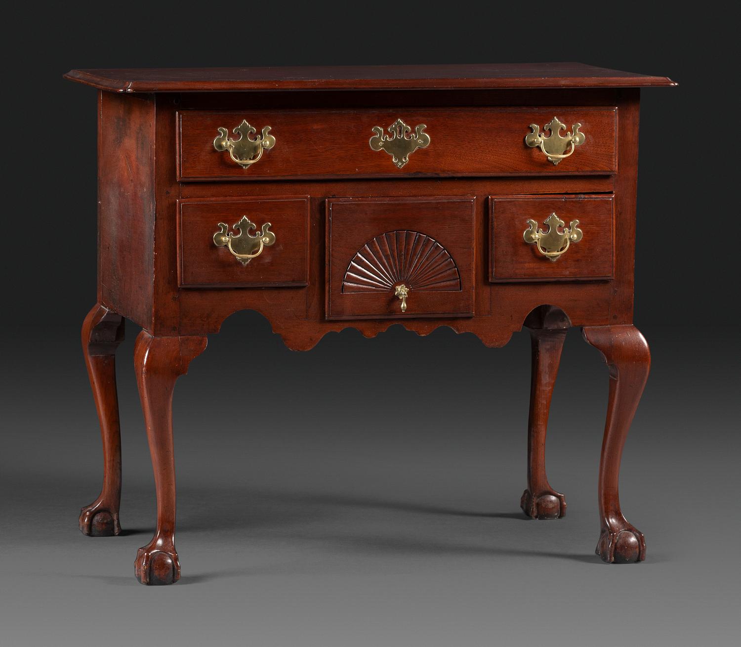 A Chippendale Fan-Carved Walnut Claw-and-Ball Foot Dressing Table
