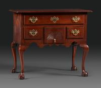 A Chippendale Fan-Carved Walnut Claw-and-Ball Foot Dressing Table
