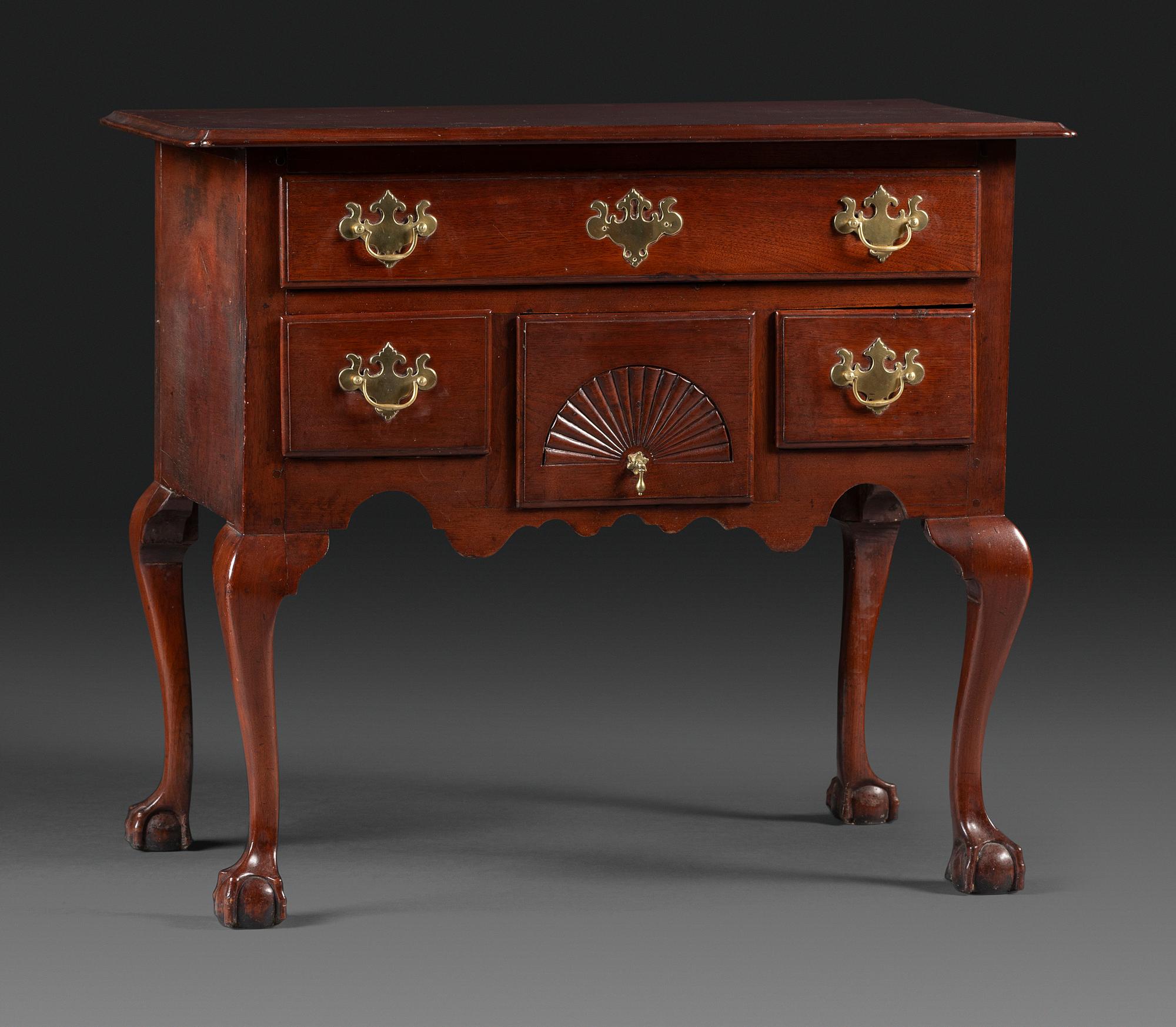 A Chippendale Fan-Carved Walnut Claw-and-Ball Foot Dressing Table