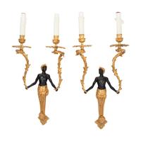 A Pair of French Gilt and Patinated Bronze Figural Two-Light Sconces