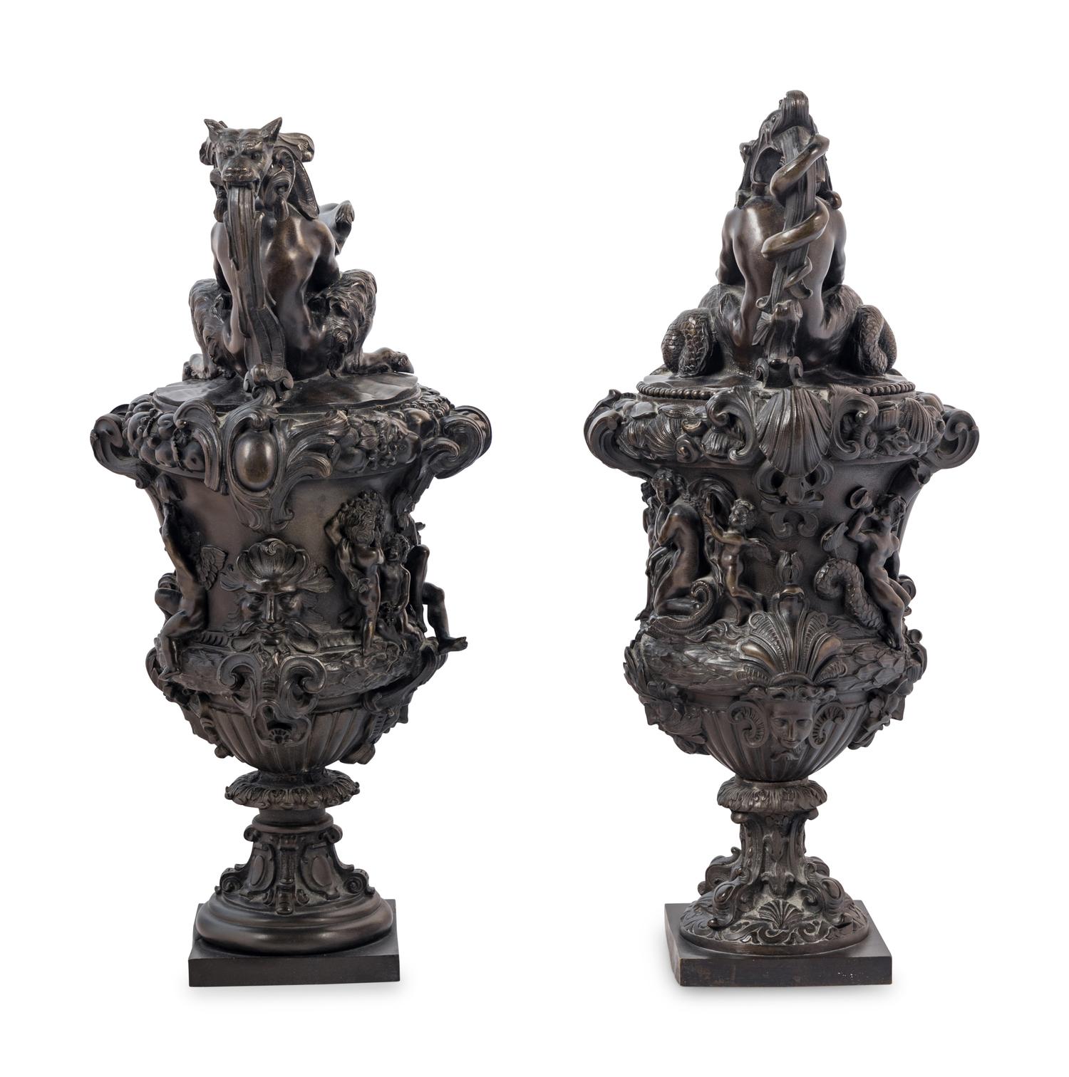 A Pair of Grand Tour Bronze Ewers Emblematic of Water and Earth