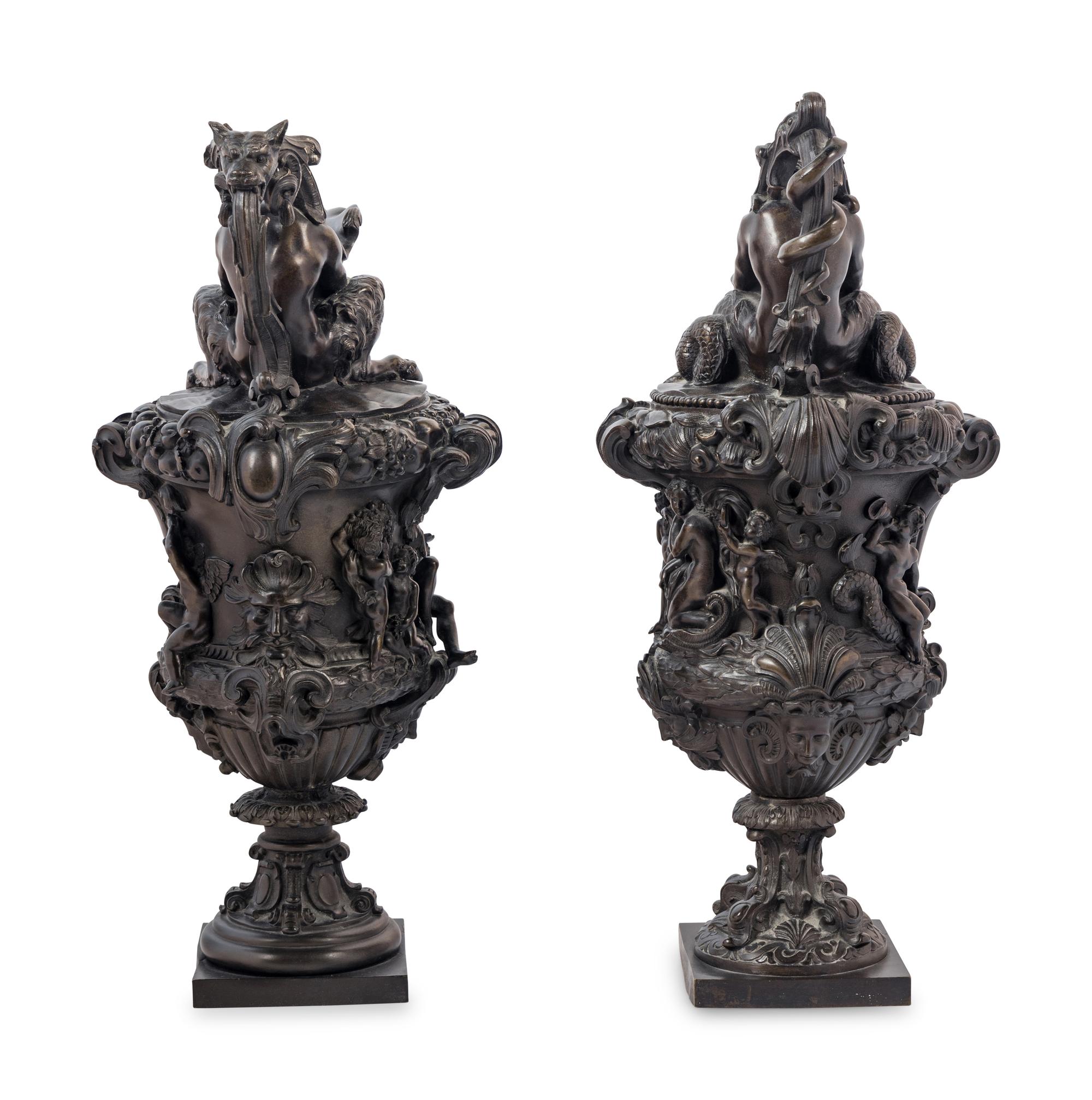 A Pair of Grand Tour Bronze Ewers Emblematic of Water and Earth