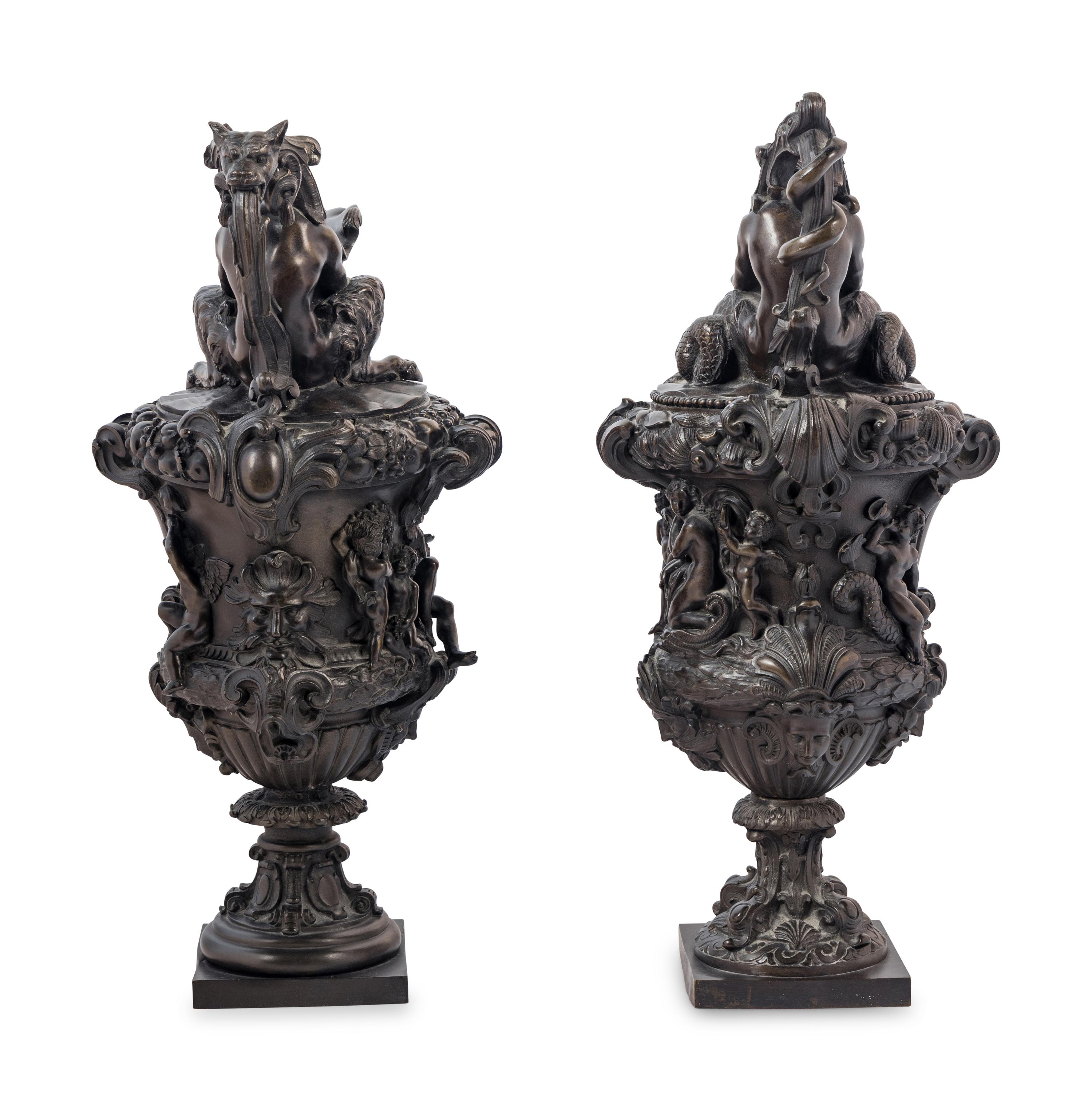 A Pair of Grand Tour Bronze Ewers Emblematic of Water and Earth