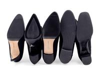 Nine Pairs of Designer Boots: Five Manolo Blahnik, Two Prada, One Delage, One Roger Vivier