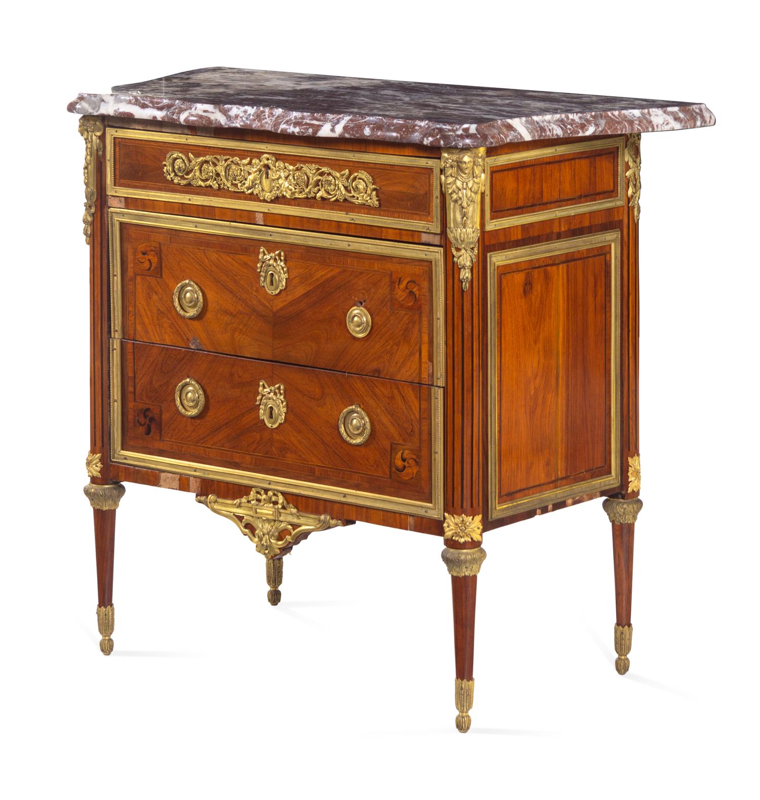 A Louis XVI Gilt Bronze Mounted Tulipwood Commode with an Unassociated Marble Top